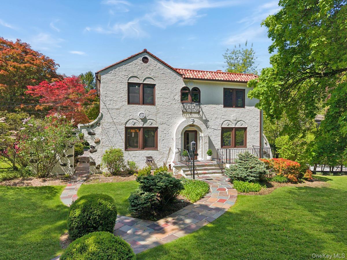 Set on a beautifully landscaped corner lot in New Rochelle’s sought-af...