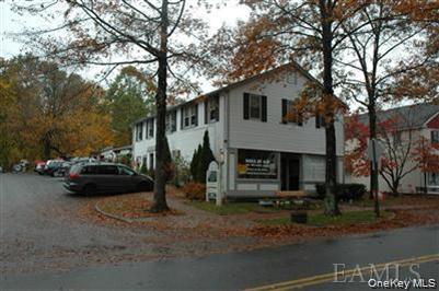 In town above shops, large three bedroom (one bedroom small) open with...