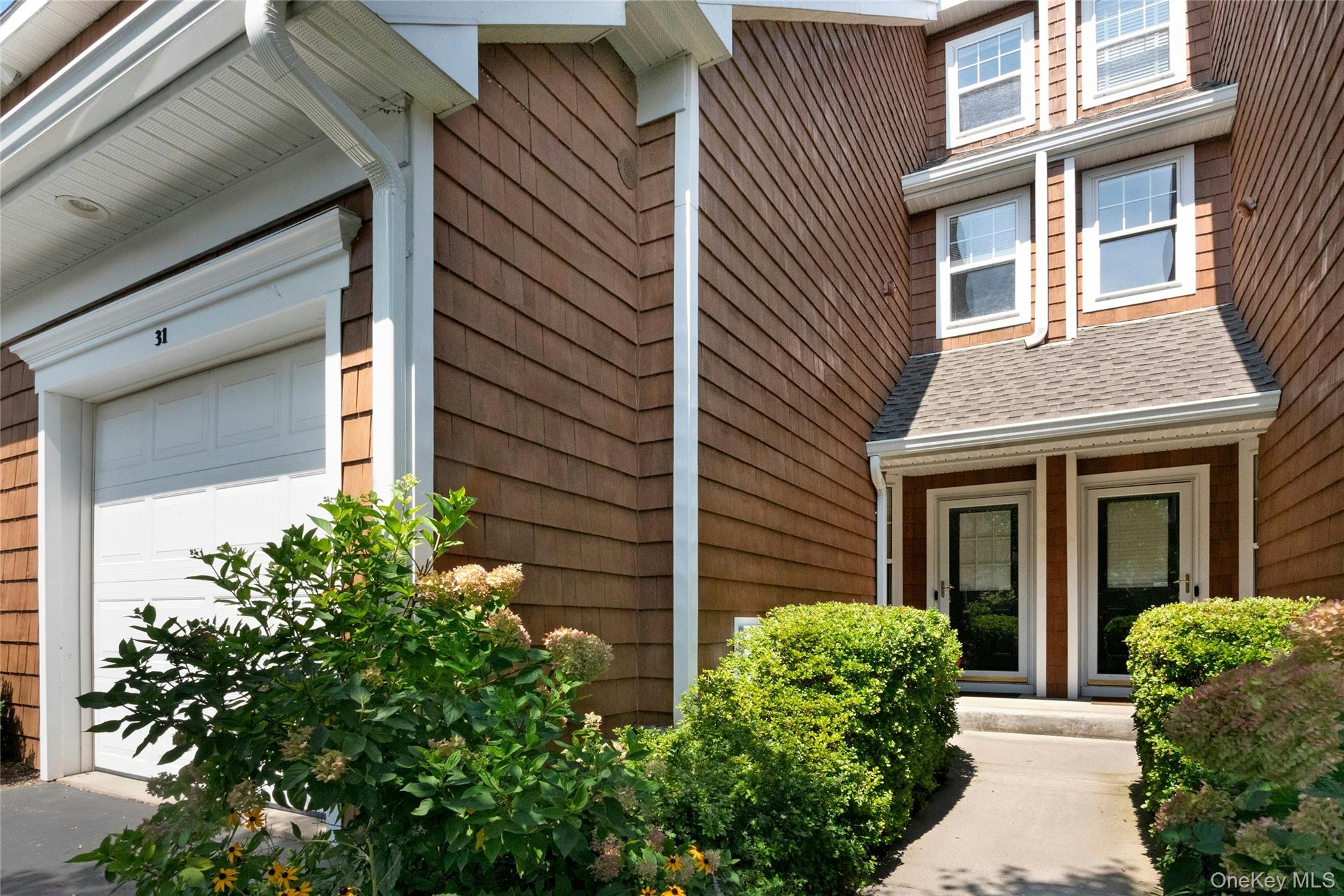 Bright and beautifully maintained, this inviting home offers private f...
