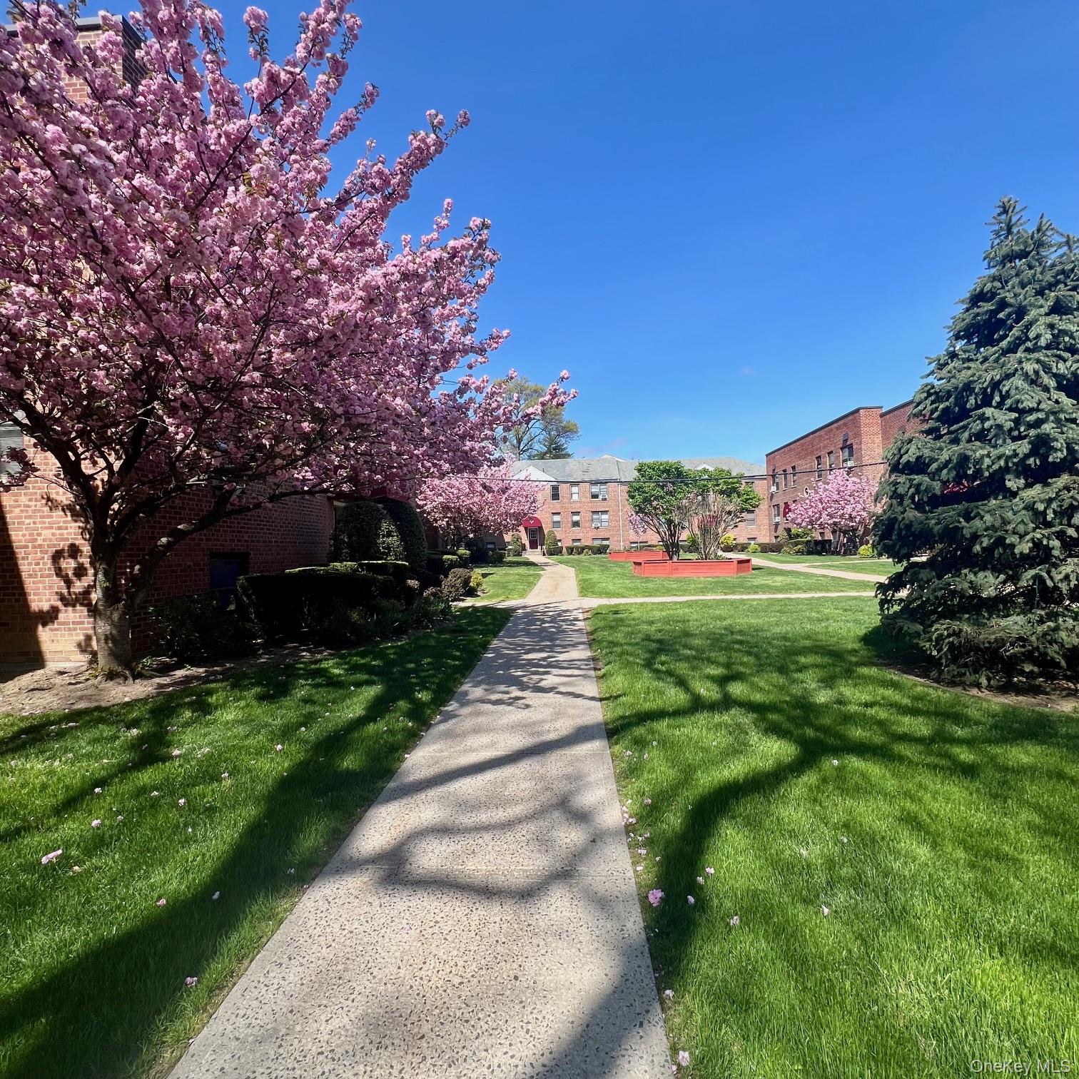 Sunny unit on a quiet court side of a highly desirable Mamaroneck Gard...