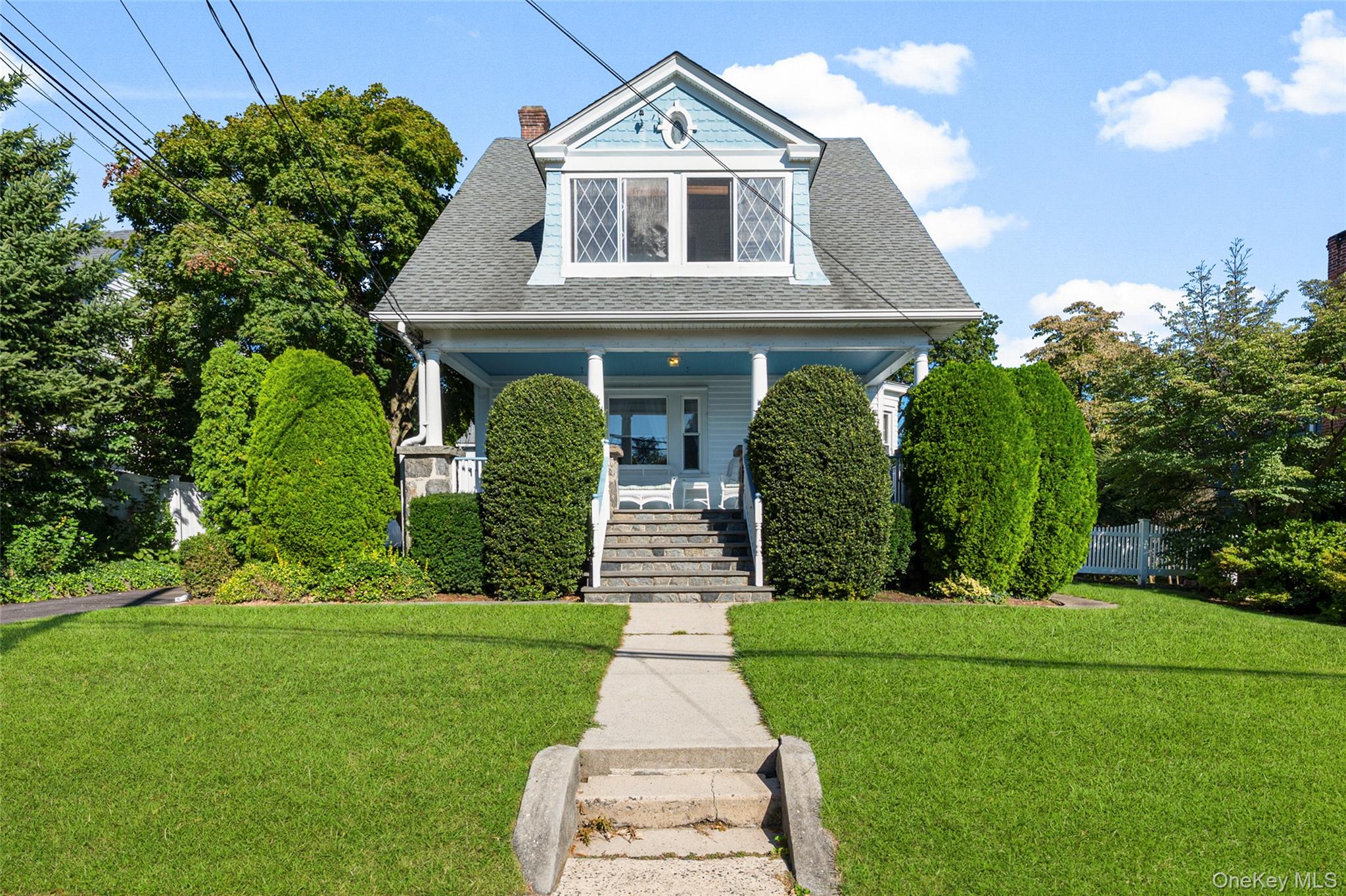 Welcome to 18 Coakley Avenue, a storybook Victorian in the heart of Ha...