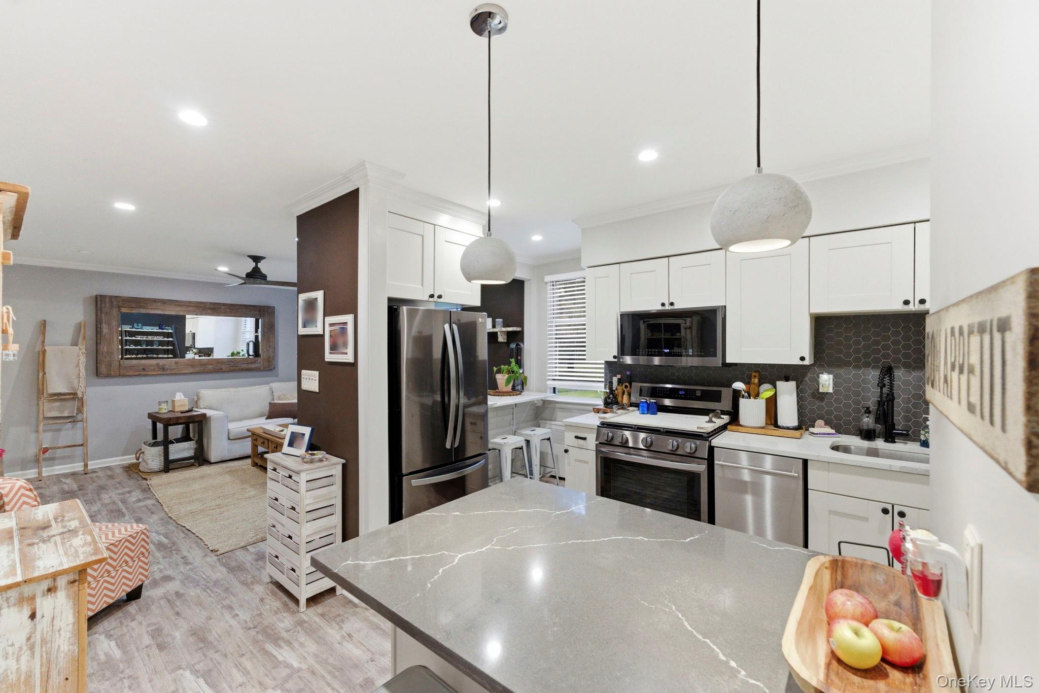 Welcome to this well-maintained 2-bedroom home in White Plains offerin...