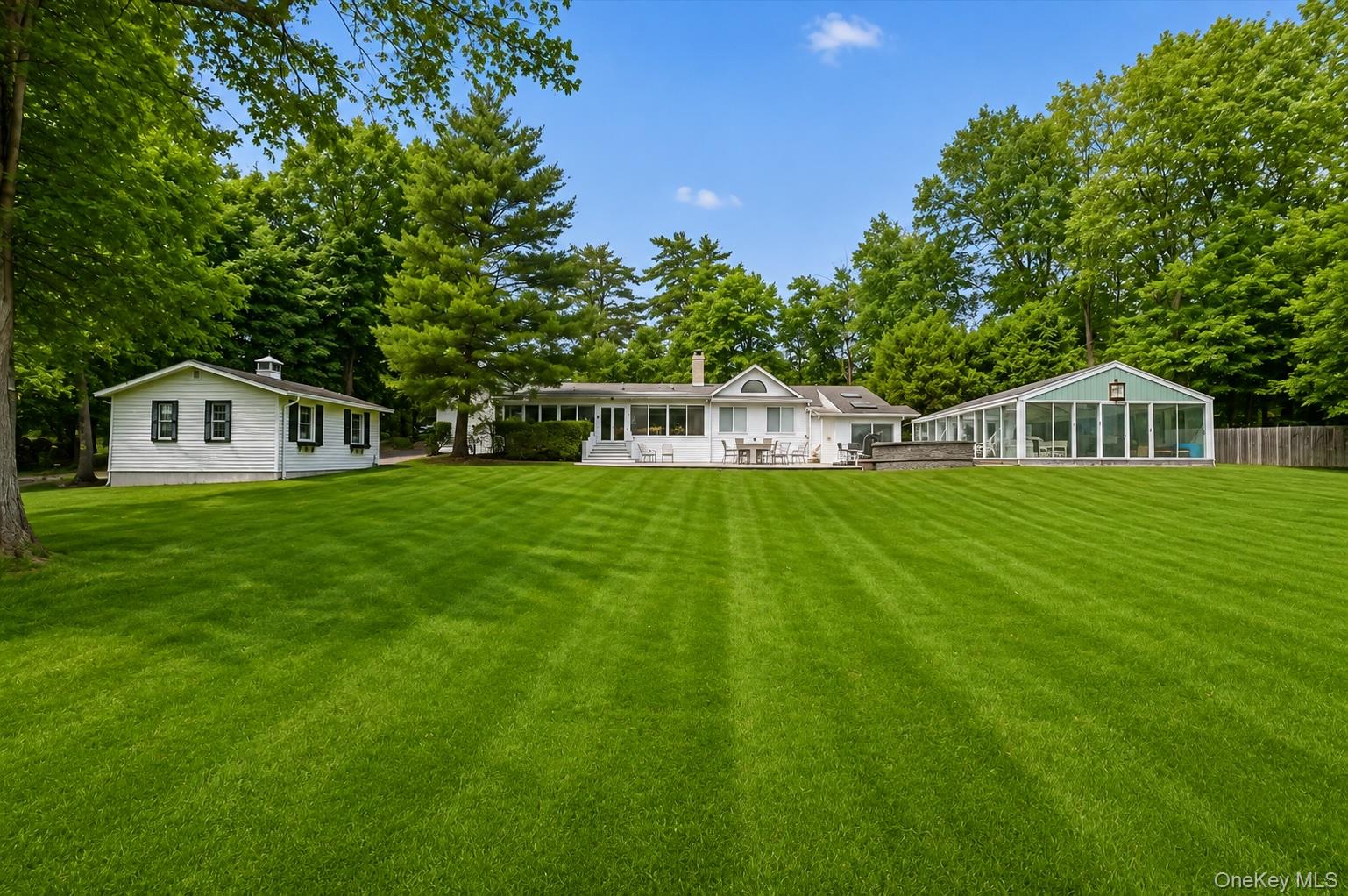 An understated ranch-style exterior gives way to a sophisticated, Medi...