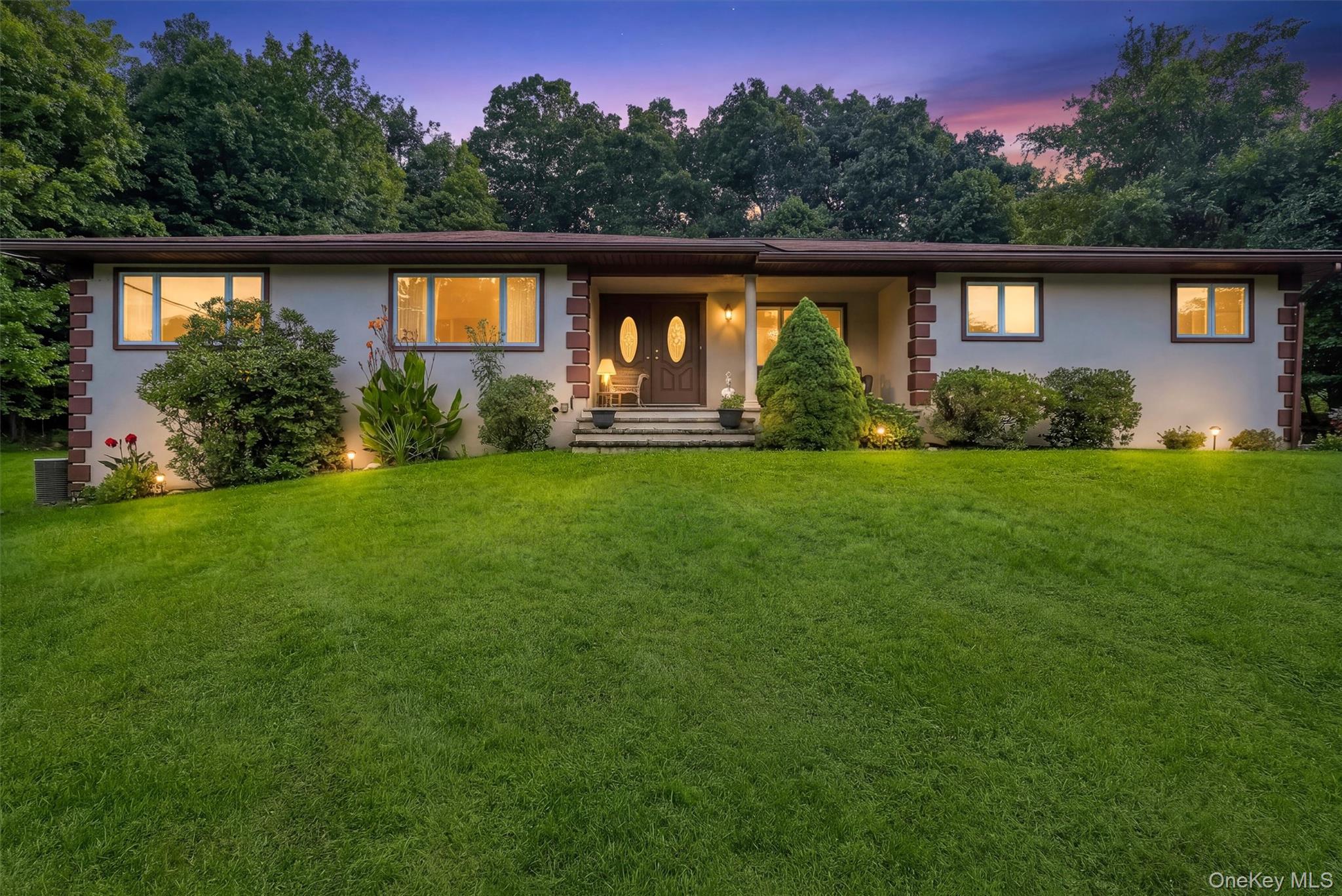 Experience the elegance of this exquisite ranch-style residence situat...