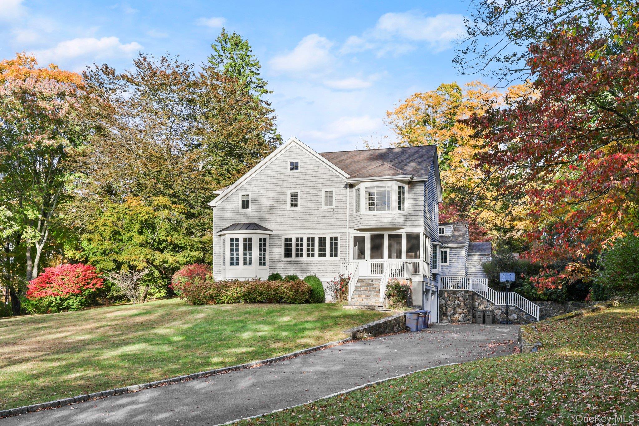 Welcome to 10 Hickory Lane, a charming 4-bedroom, 3-bath offering a pe...