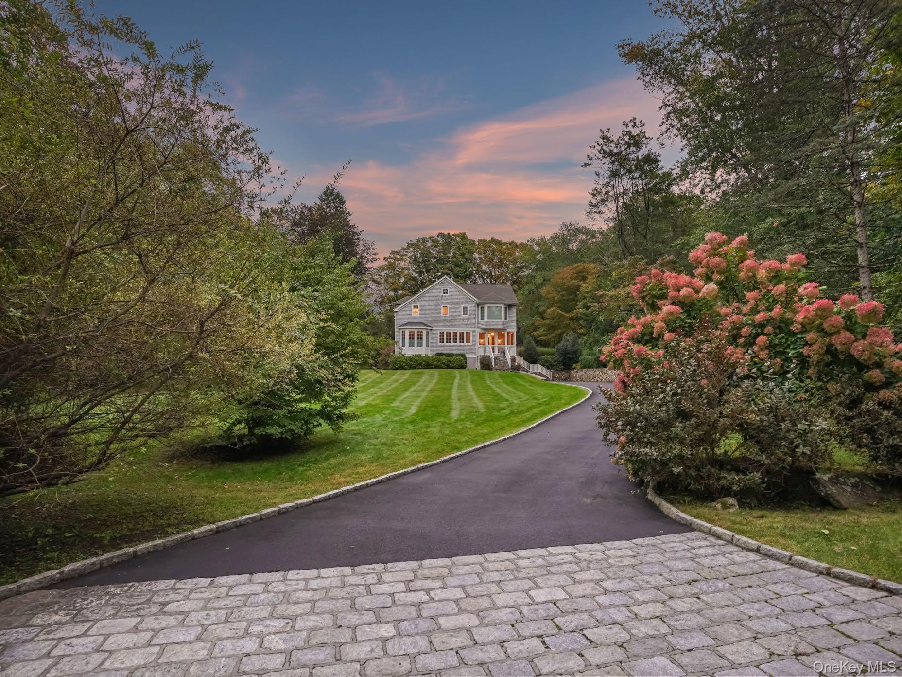 Welcome to 10 Hickory Lane, a charming 4-bedroom, 3-bath offering a pe...