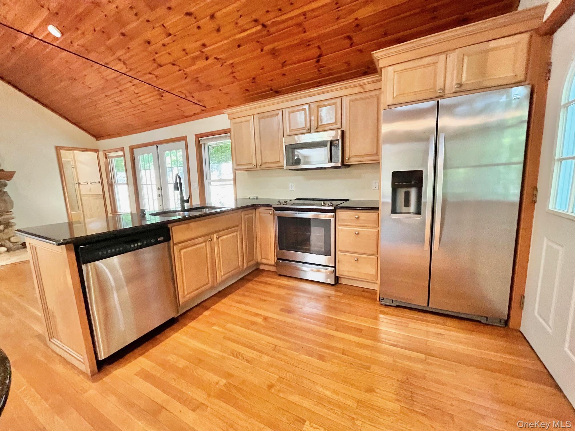 Stunning and Renovated 2 Bedroom, 1 Bathroom Waterfront Home Along Hol...