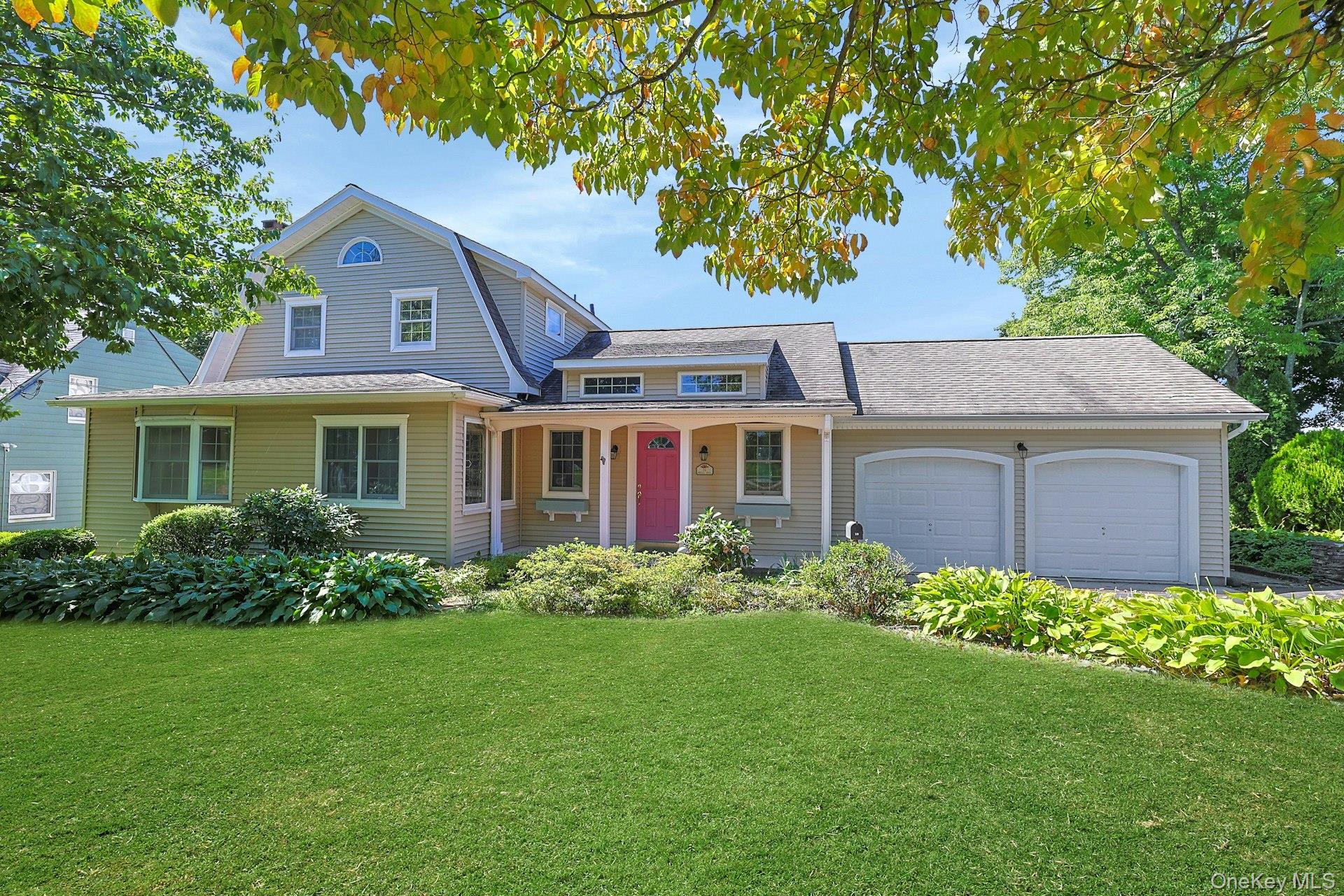 Truly inviting, this expanded Dutch Colonial is filled with warmth, ch...