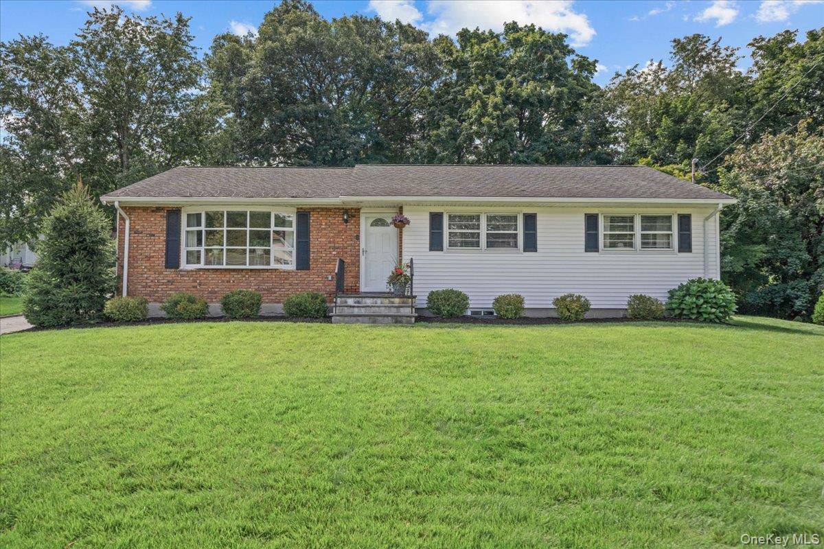 Set on a level third of an acre in the heart of the Bedford Hills haml...