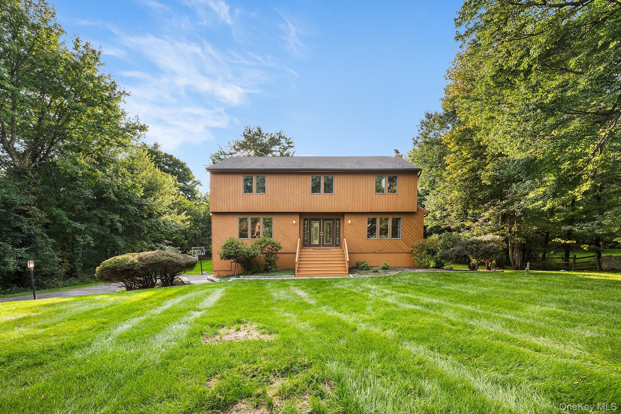 Welcome home to Apple Hill. This center hall colonial is set on more t...