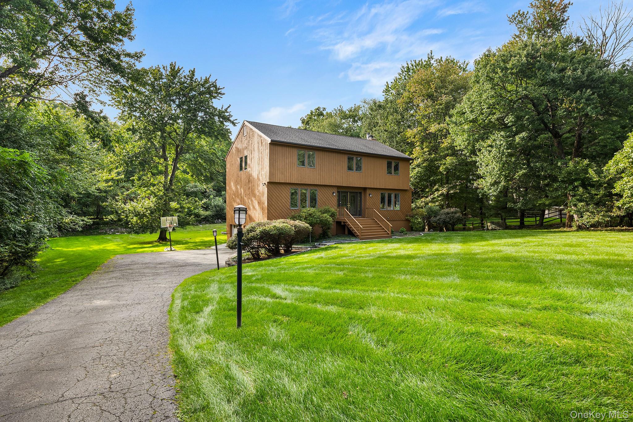 Welcome home to Apple Hill. This center hall colonial is set on more t...