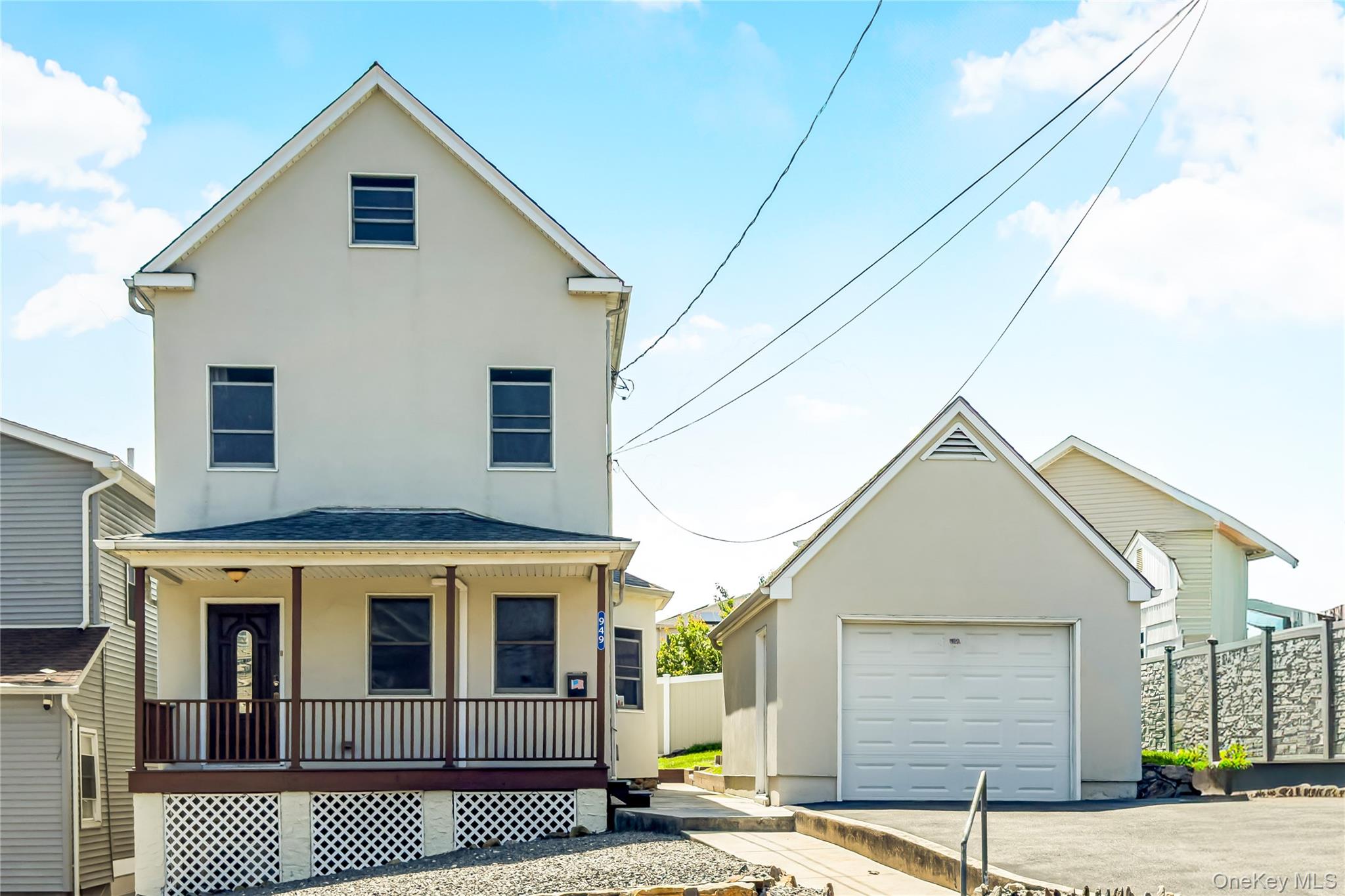 Introducing 949 Mile Square Road.  This bright and spacious single fam...