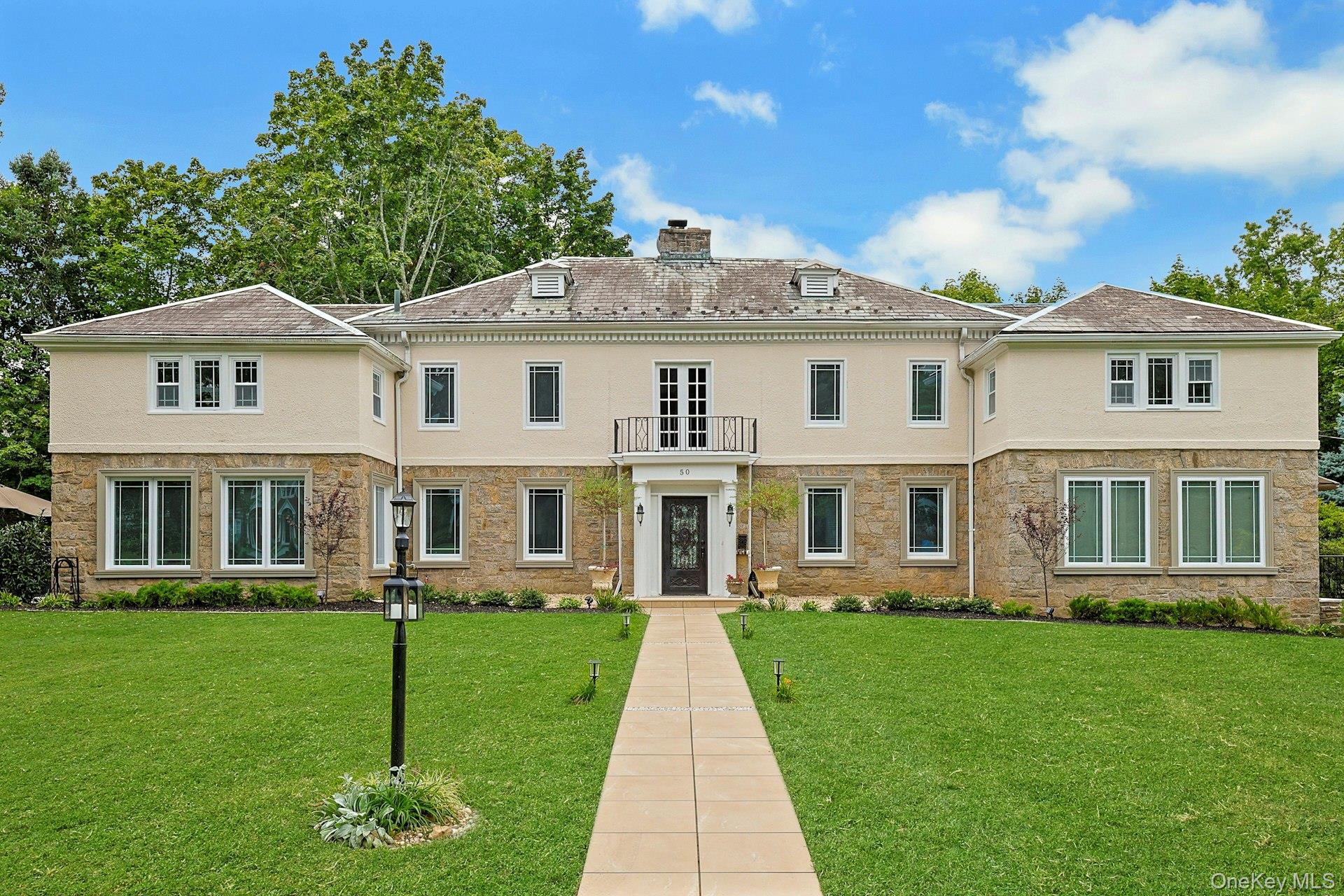 Welcome to 50 Forest Circle, a stunning, newly restored 6-bedroom, 4.5...