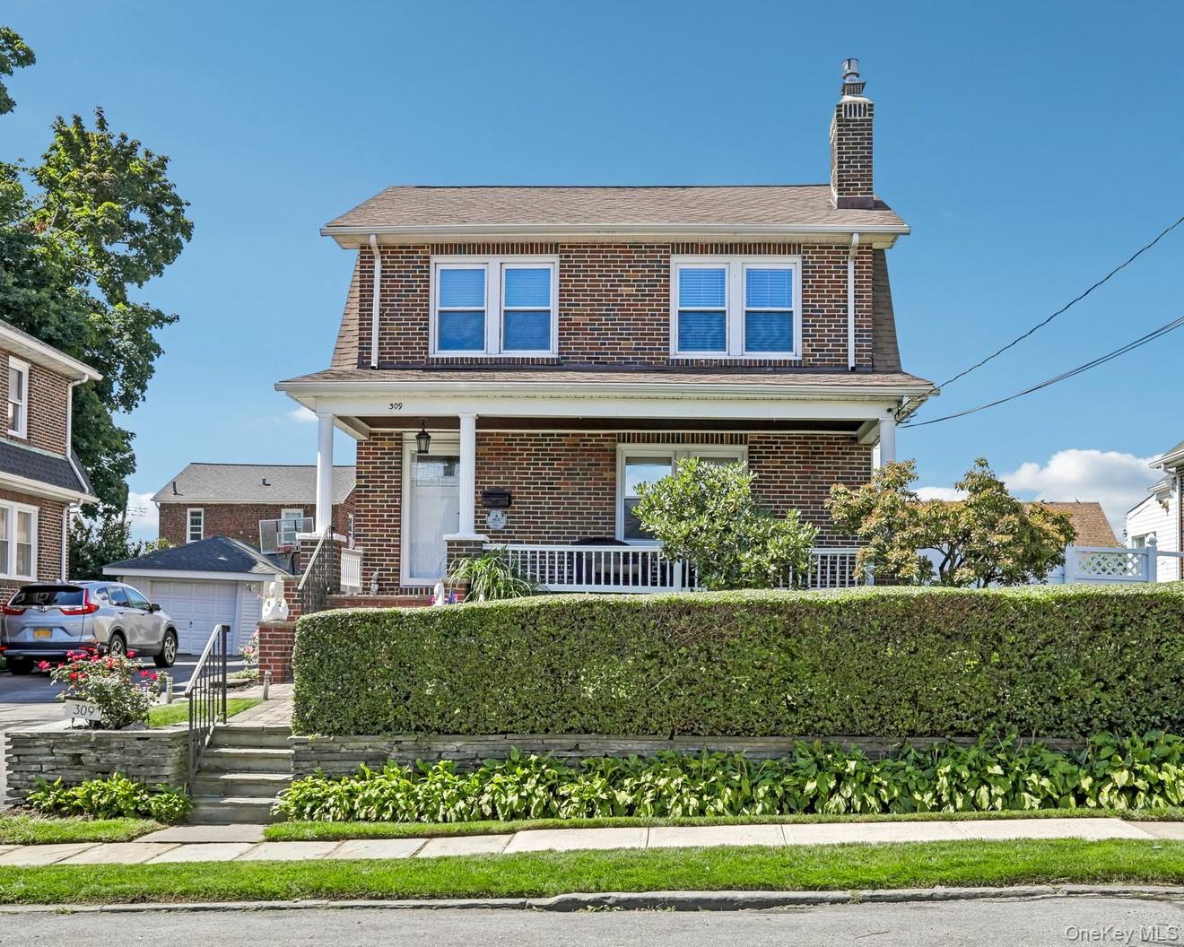 Welcome to this beautifully maintained 1936 Dutch Colonial, offering t...