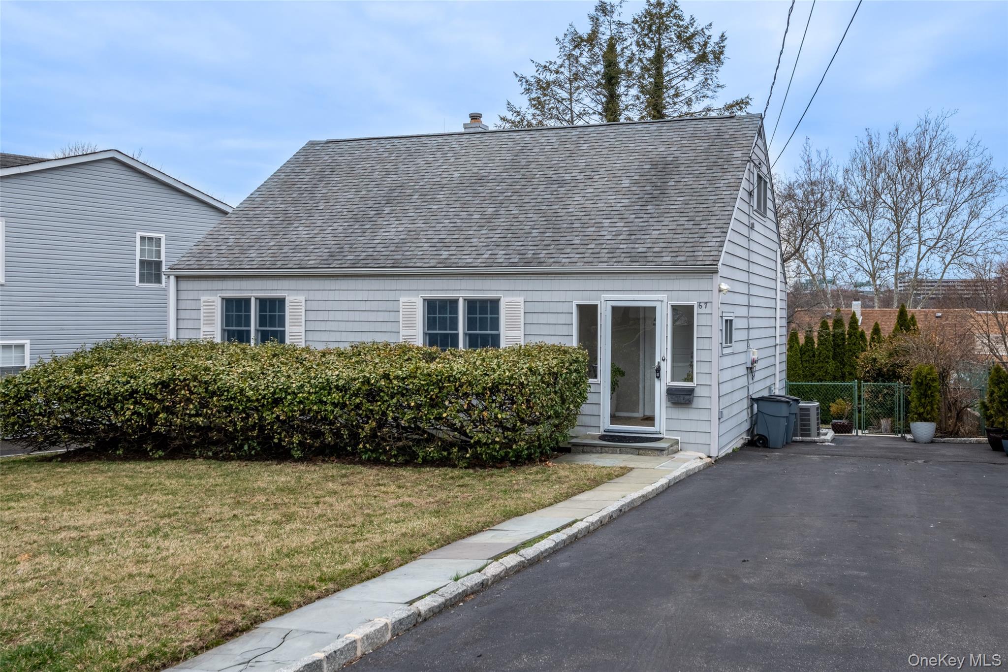 Charming Cape Cod with Beautiful Outdoor Space! Welcome to this beauti...