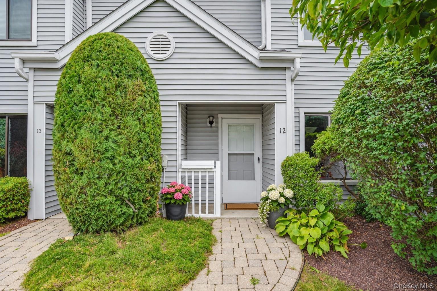 Set within the desirable Villas on the Lake community, this two-bedroo...