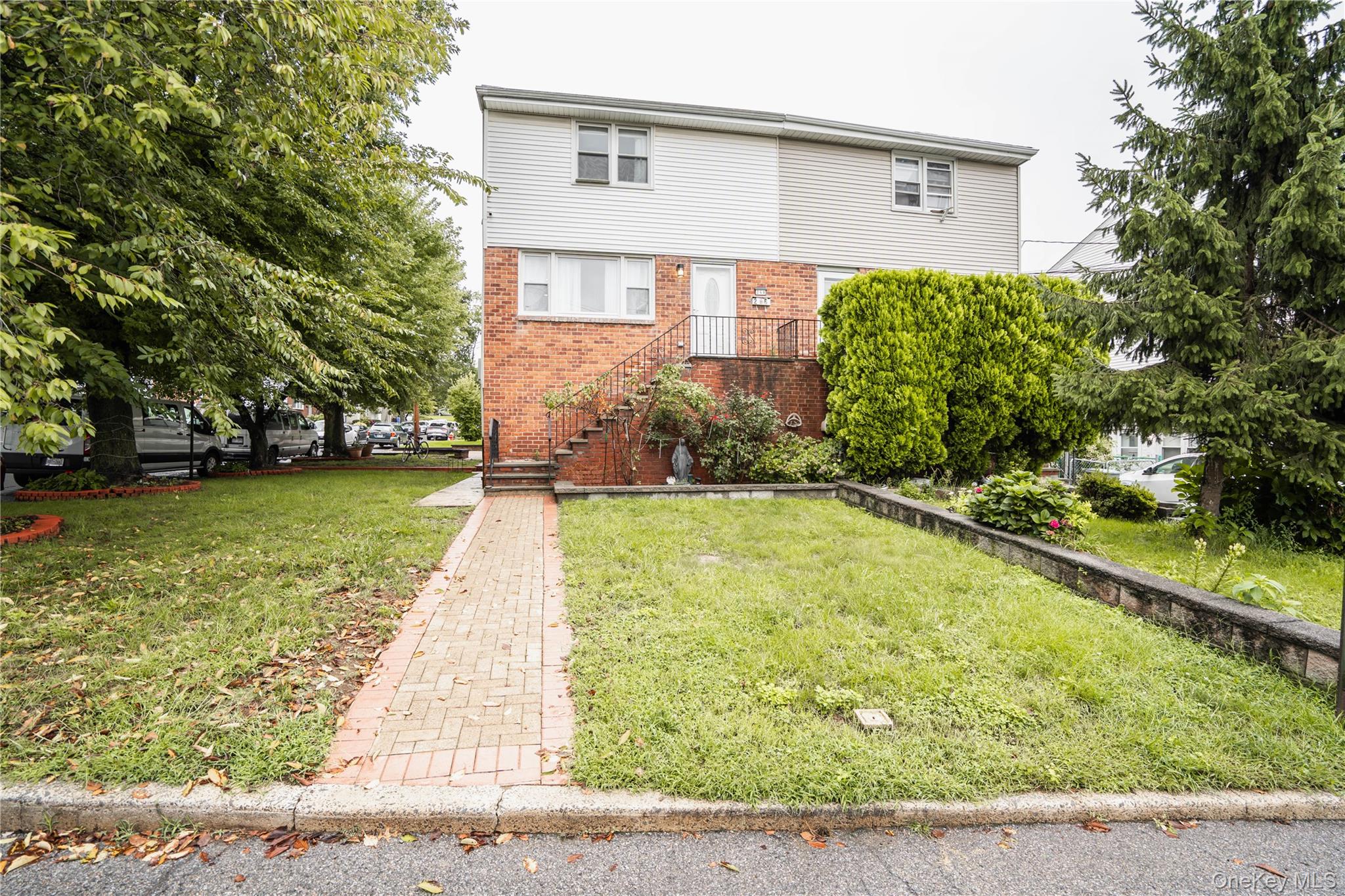 Welcome to this charming two-family home ideally situated on a desirab...