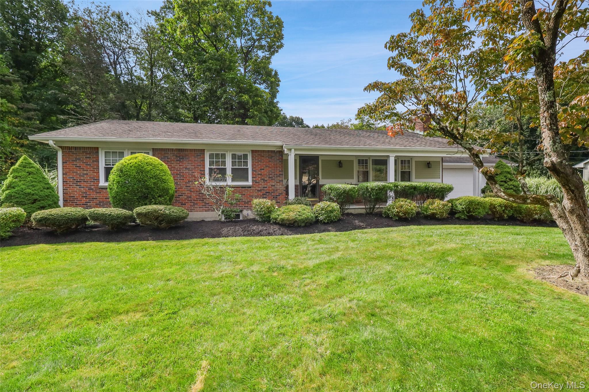 Beautifully updated 3-bedroom, 2-bath ranch tucked away on nearly an a...