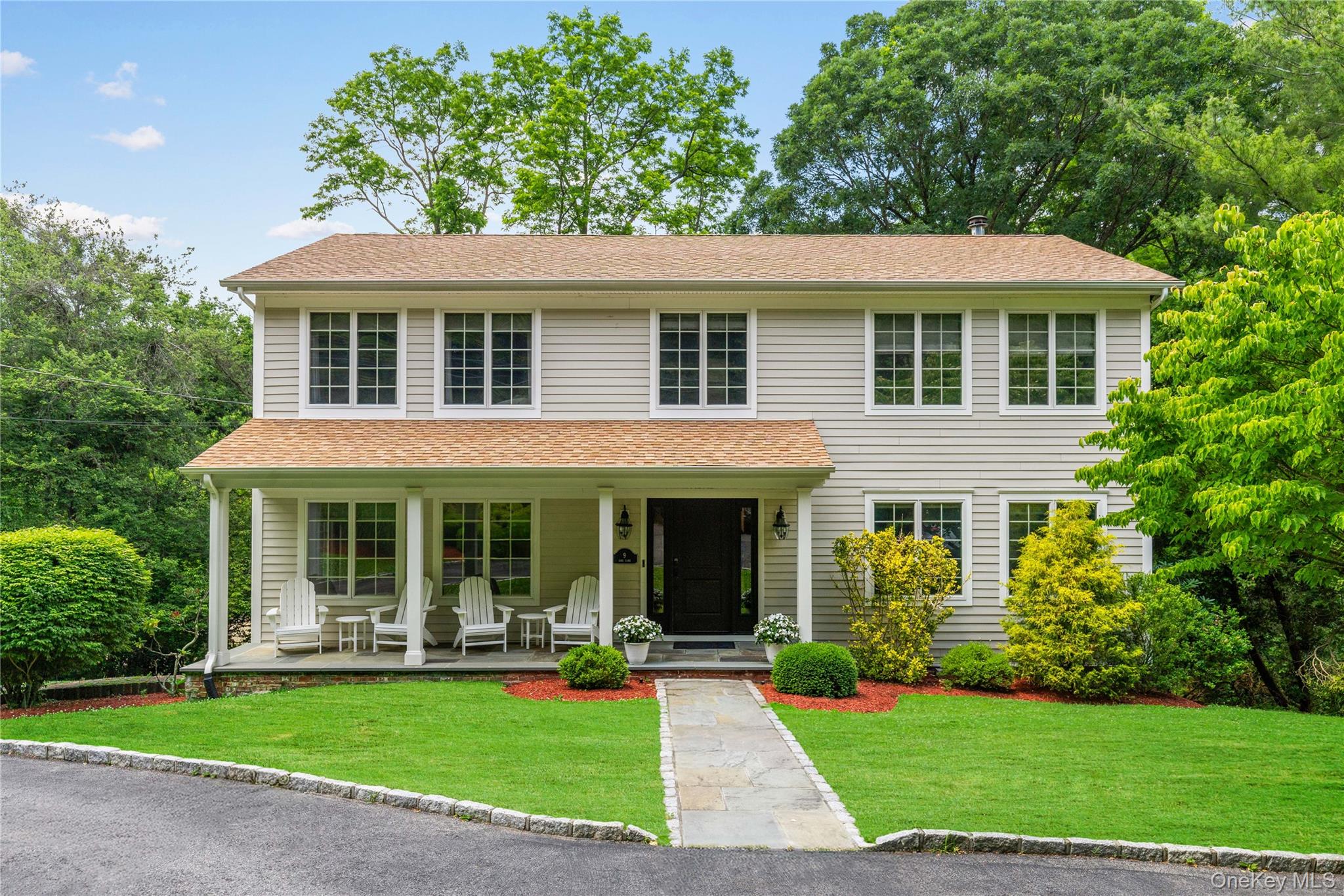 Welcome home to Chappaqua's best kept secret right in town! This class...