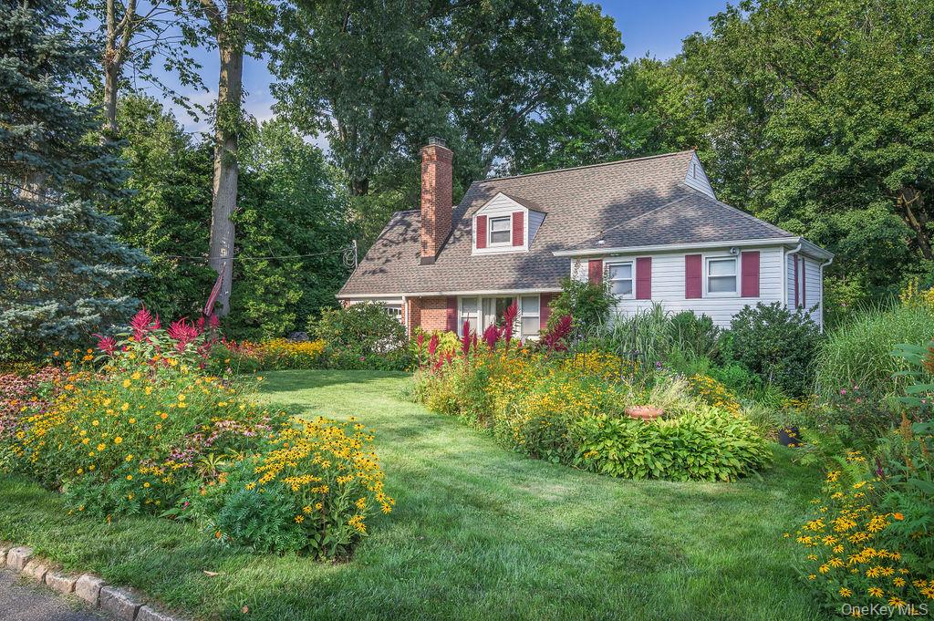 Beautifully maintained and situated on a very quiet street, this invit...