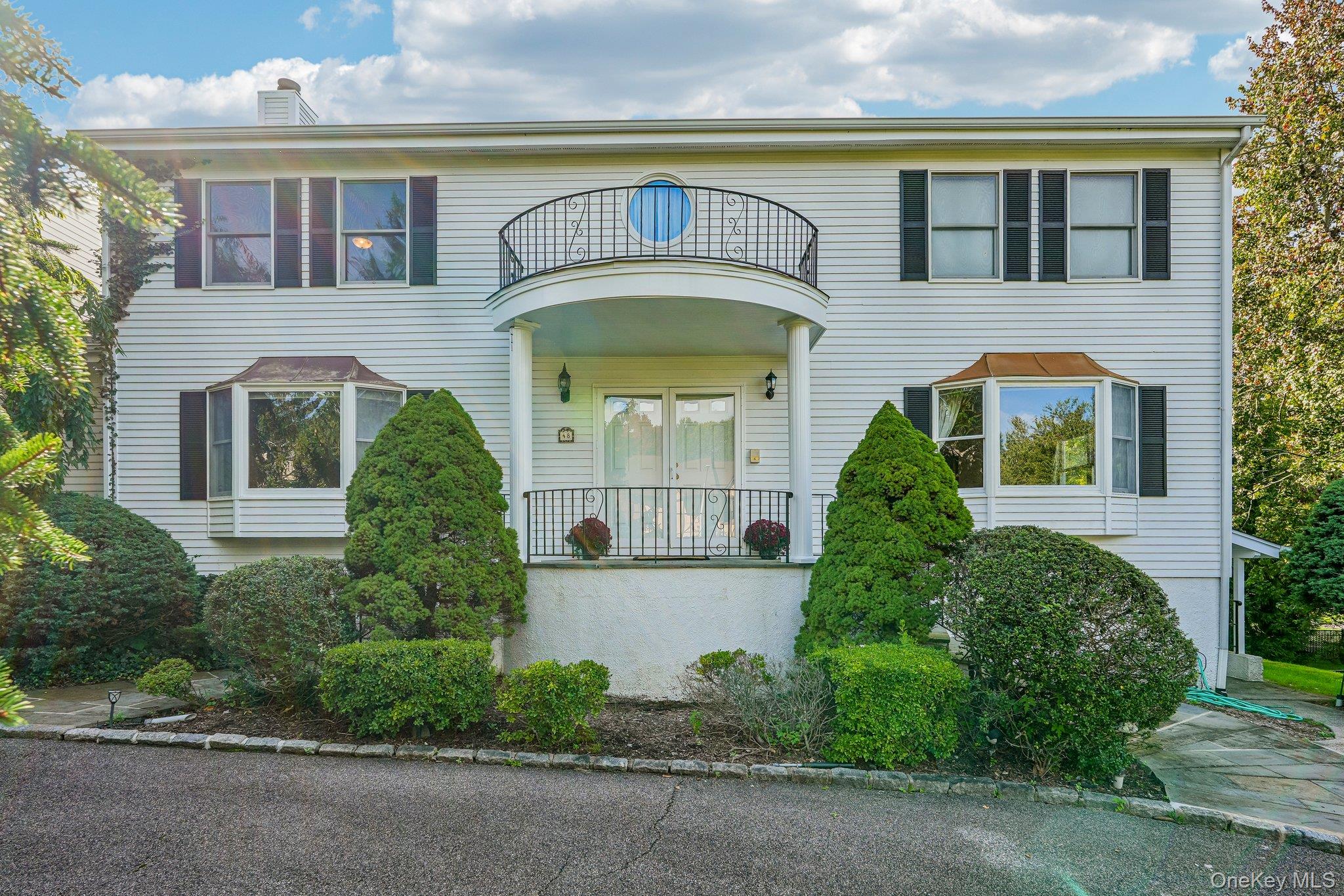 Set on a beautiful, level .69-acre property, 48 Westchester View Lane...