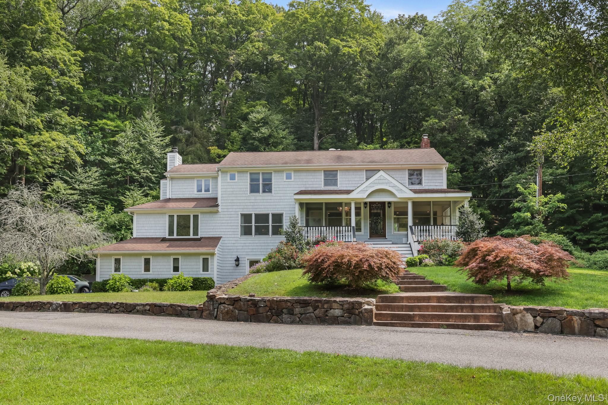 Set on over five secluded acres with picturesque pond and woodland vie...