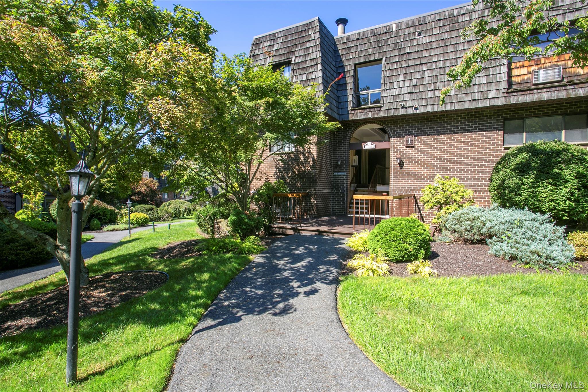 Set among the mature landscaping and beautifully maintained grounds of...