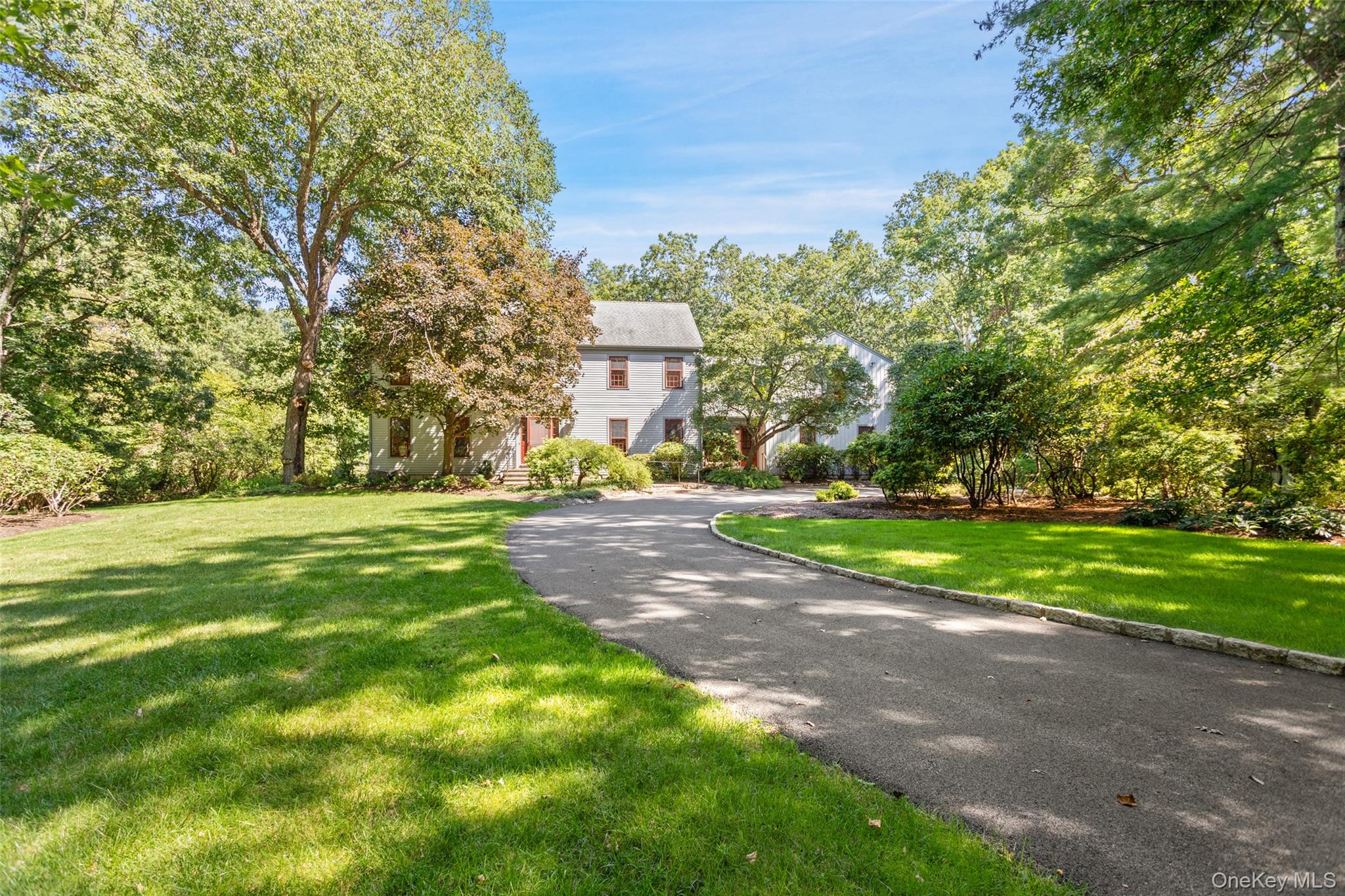 OVER 14 PEACEFUL ACRES. Located off a quiet country lane, the perfect...