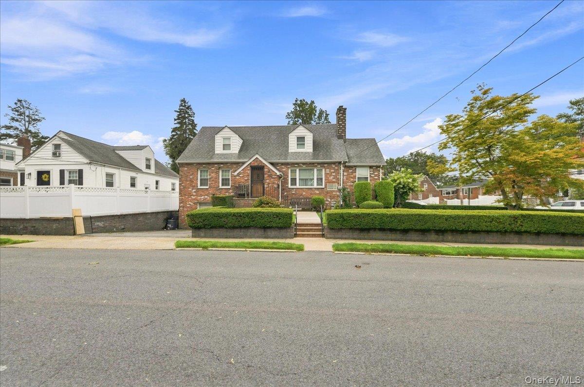 Nestled on a spacious corner lot in Yonkers' highly desirable Lincoln...