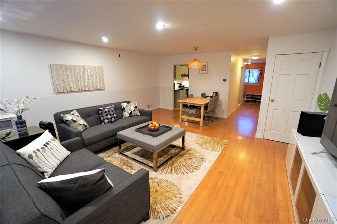 Beautiful and spacious 3 story townhouse.  This corner unit features g...