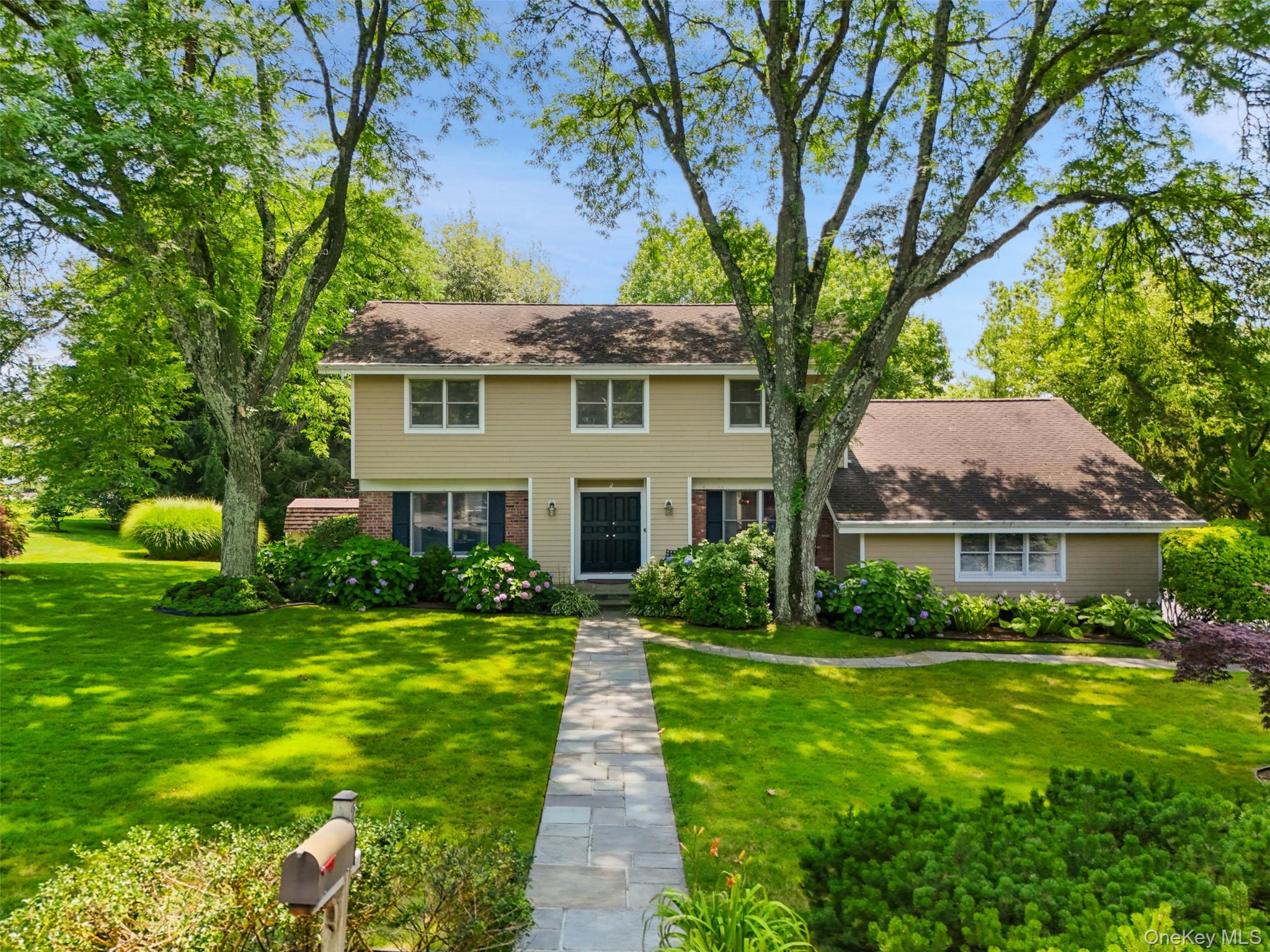 Welcome to 2 Magnolia Drive, a classic and beautifully maintained Colo...