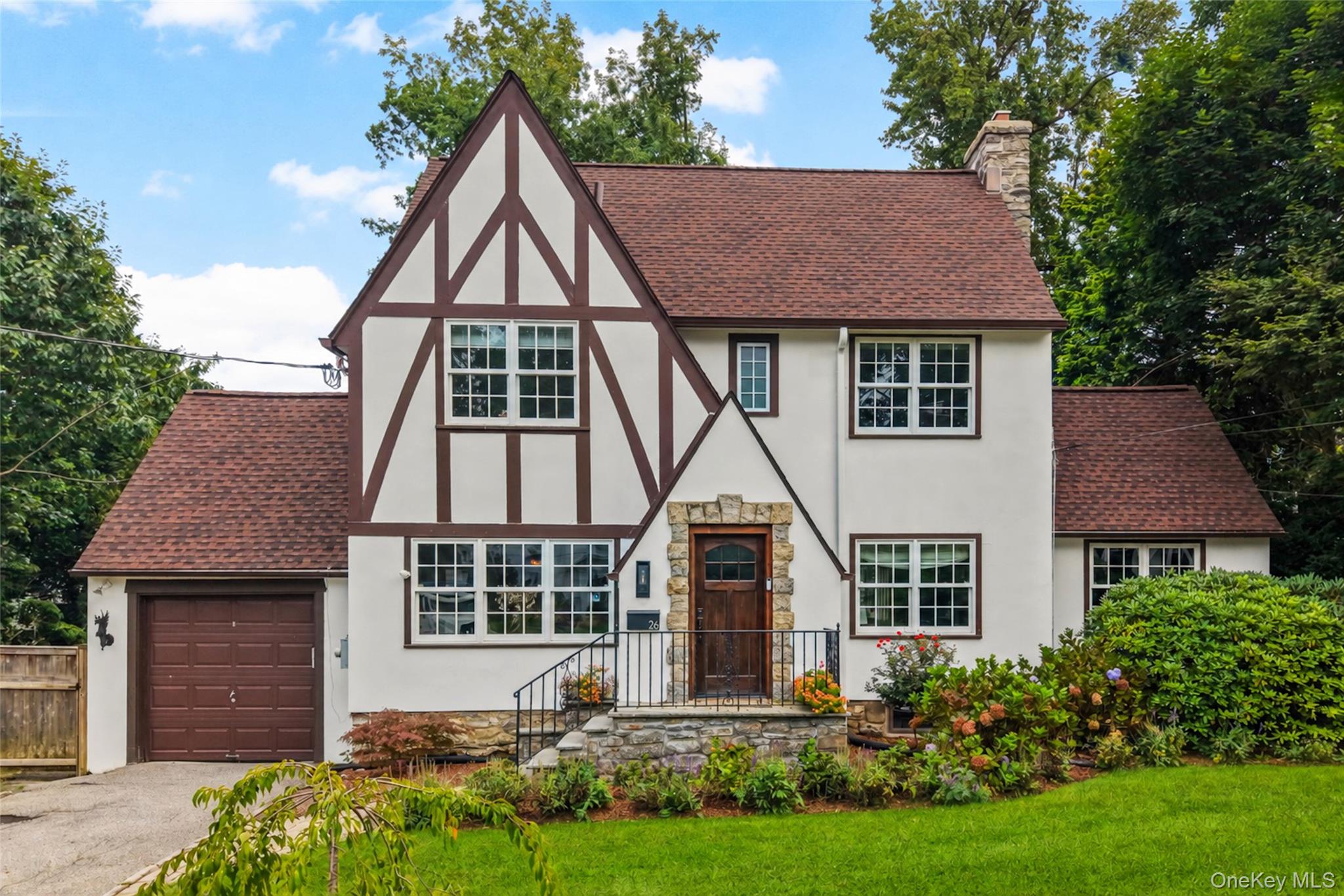 Welcome to 26 Dusenberry Road, a magnificently updated 1930 Tudor in B...