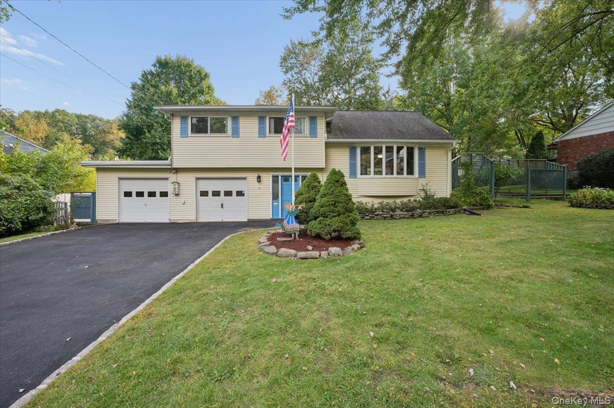 Spacious split-level ready for you to move right in. Lived in by one f...