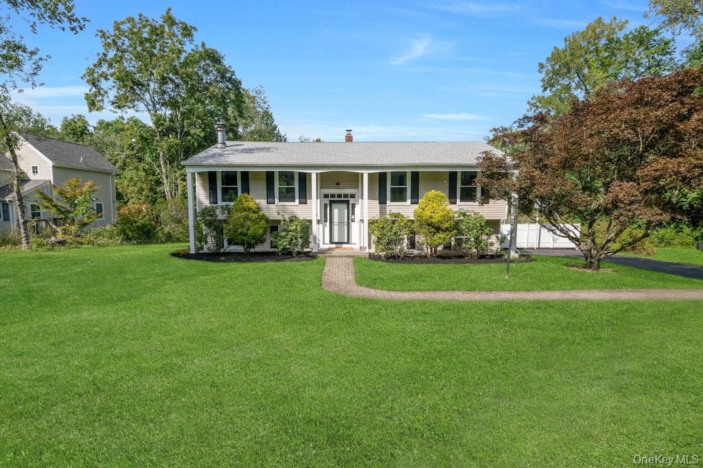 Your own private acre awaits in this peaceful pocket of Yorktown Heigh...