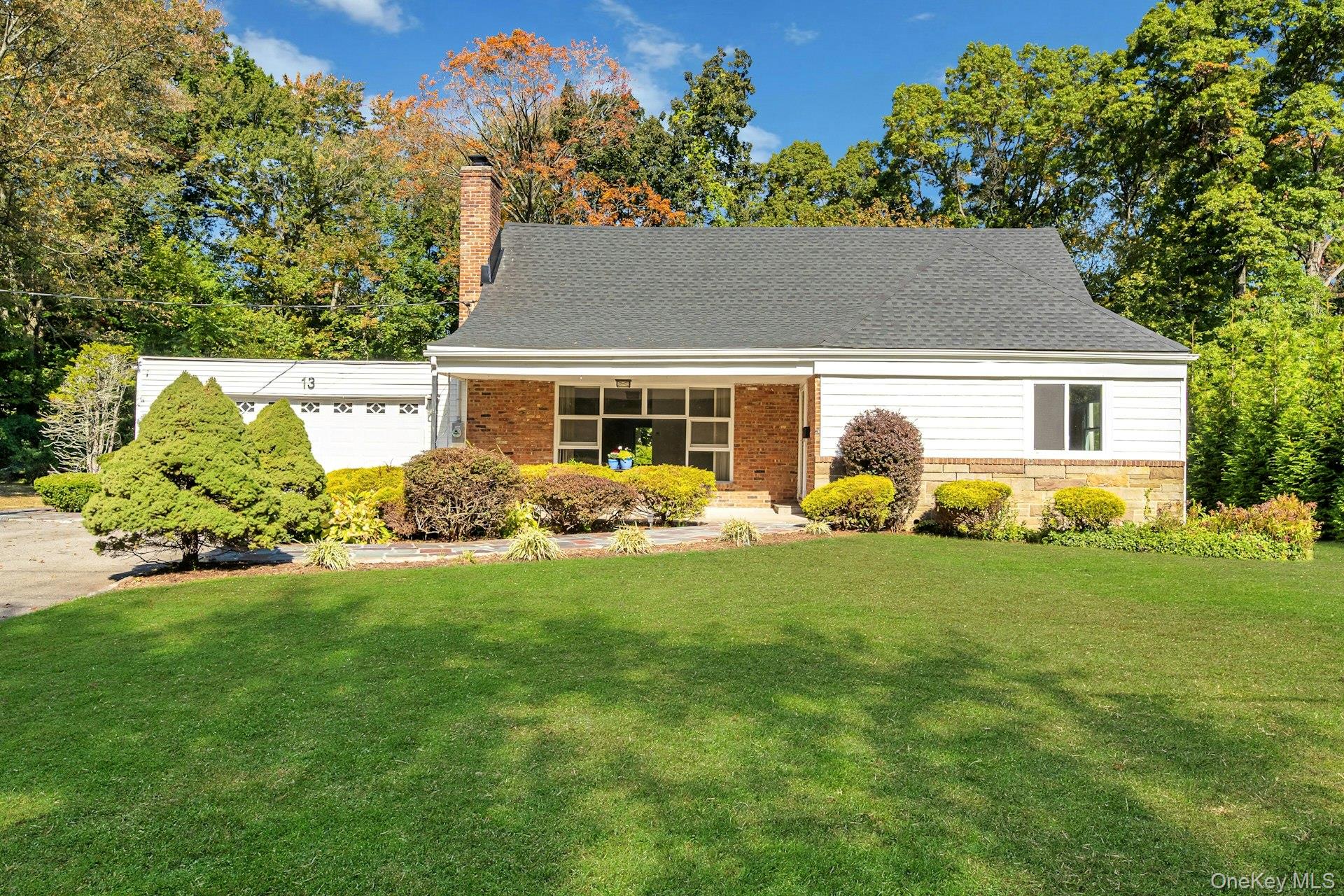 Nestled in the sought-after Quaker Ridge section of Scarsdale, this be...
