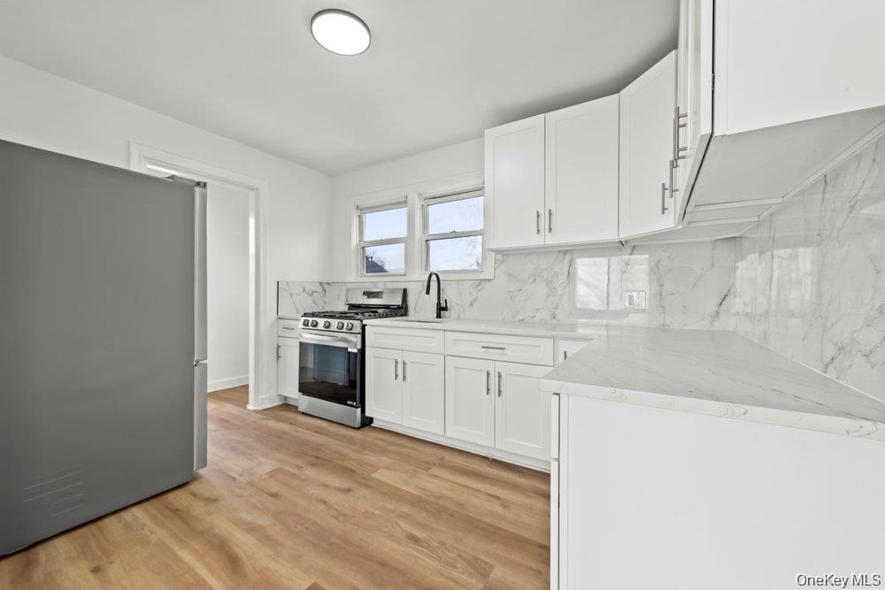 Modern, updated 2-bedroom apartment located on the first floor of a we...