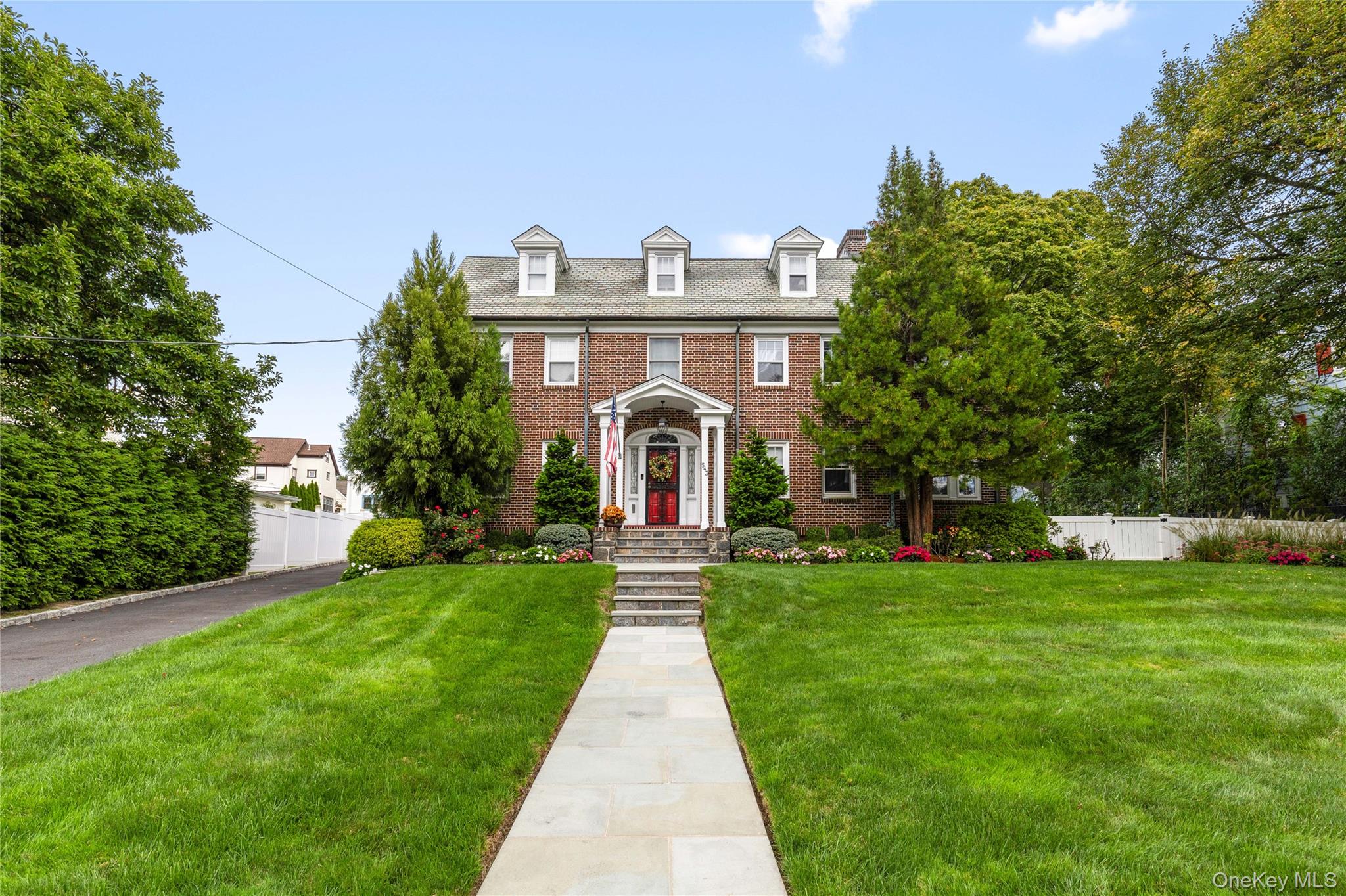 Welcome to 543 King Street, a gracious 4-bedroom, 3.5-bath Brick Colon...