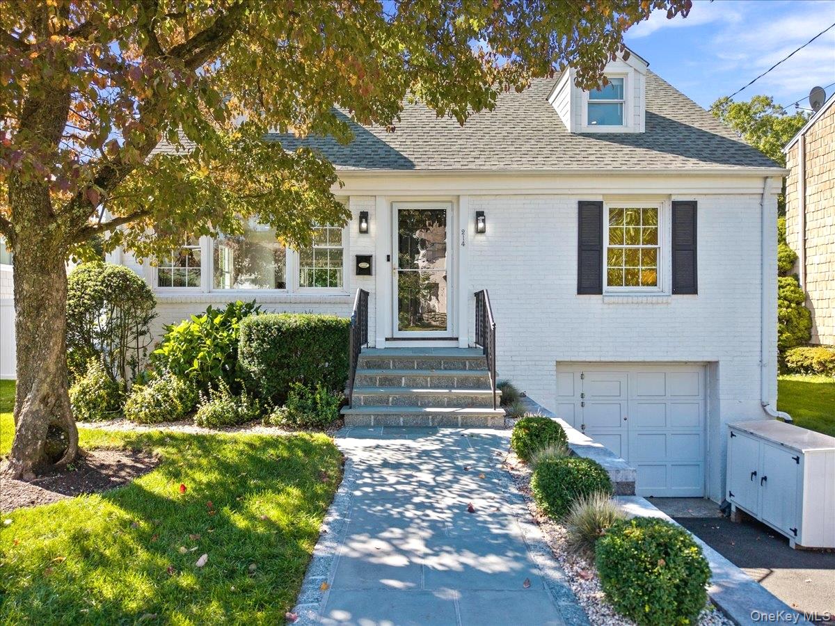 This charming and sunny Cape Cod is set on a desirable street just off...