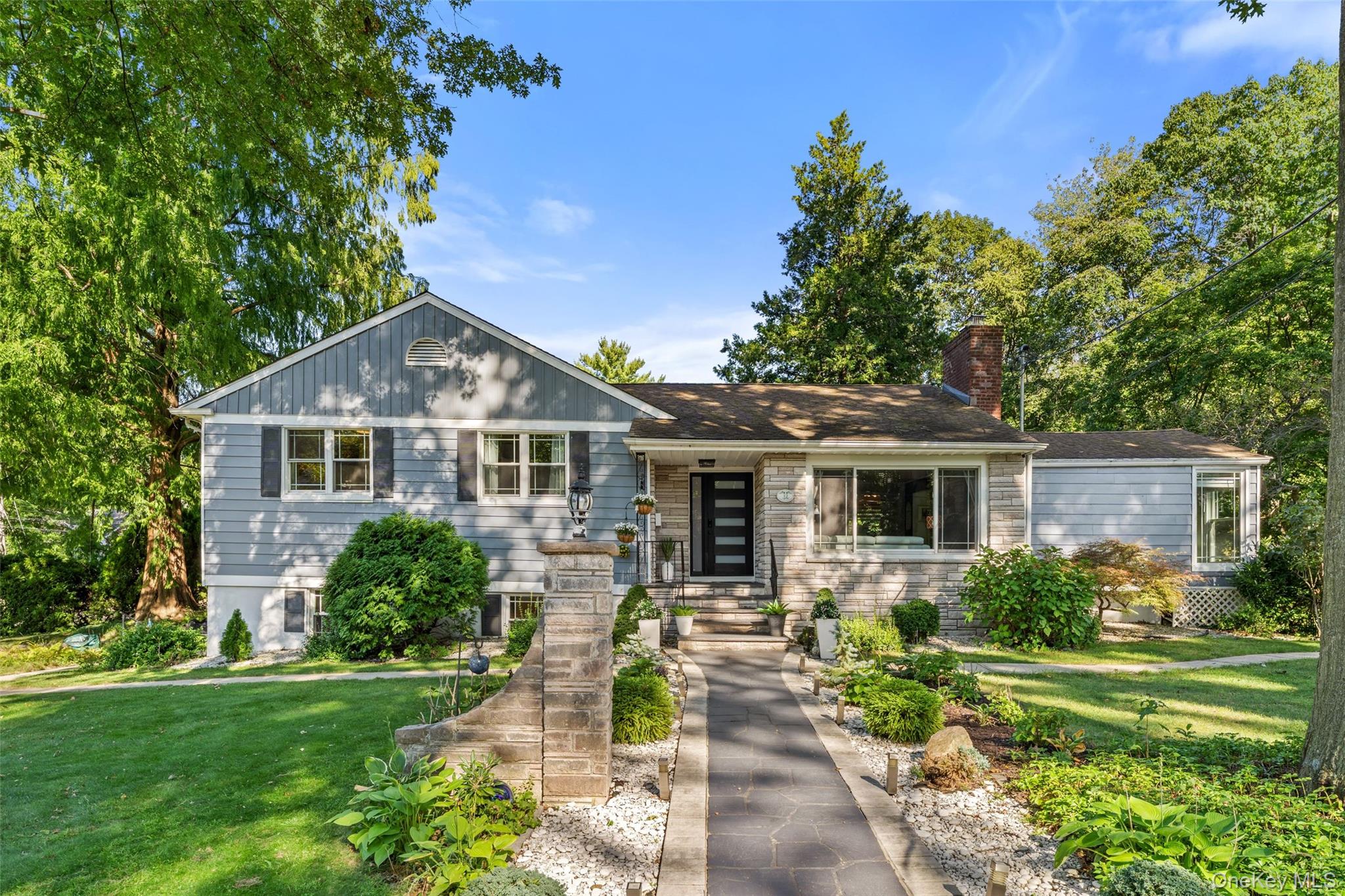 Welcome Home to this spacious and beautifully updated three-bedroom sp...