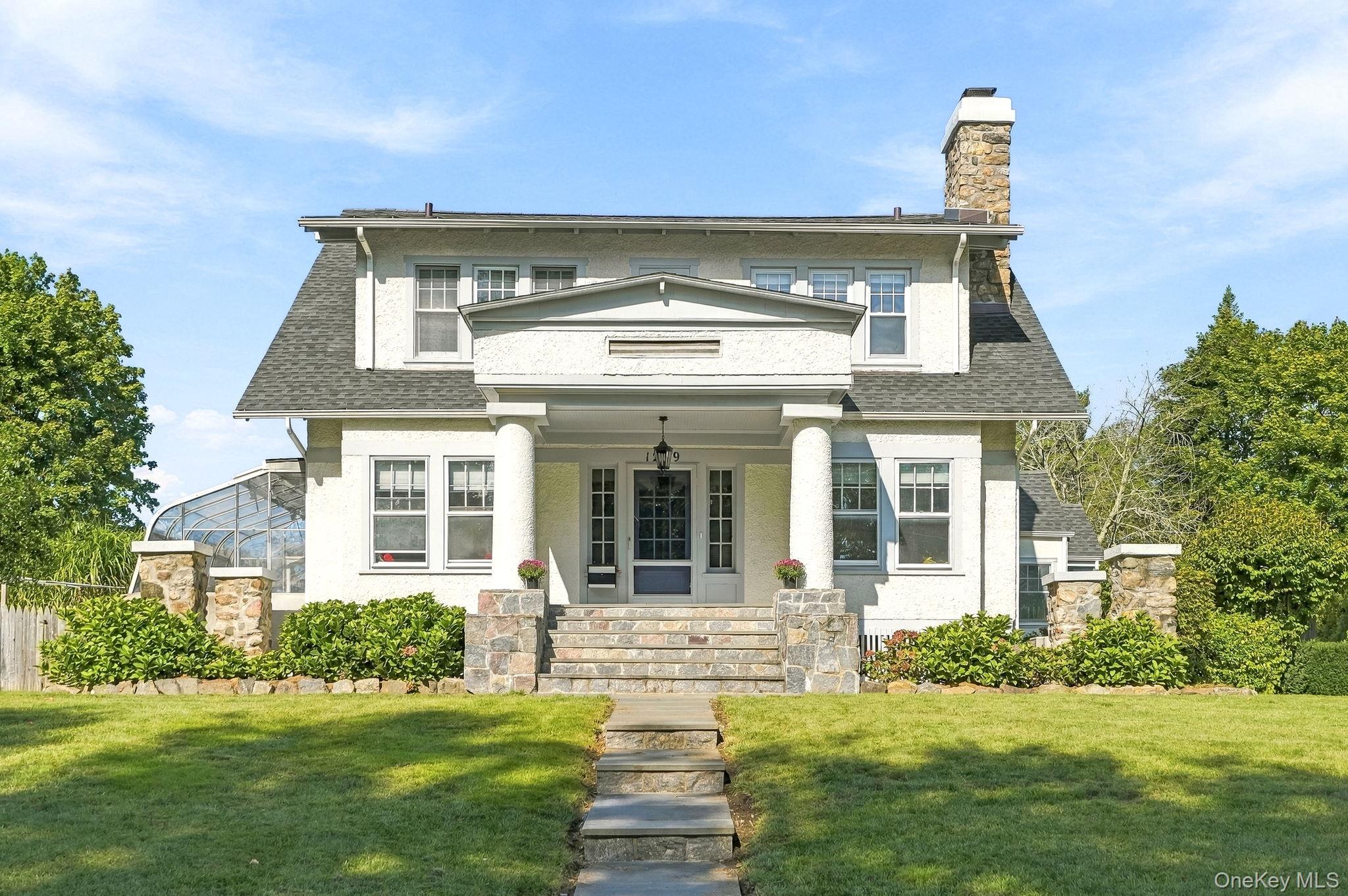Oh, what a beauty! This Turn of the Century Craftsman House, is a show...