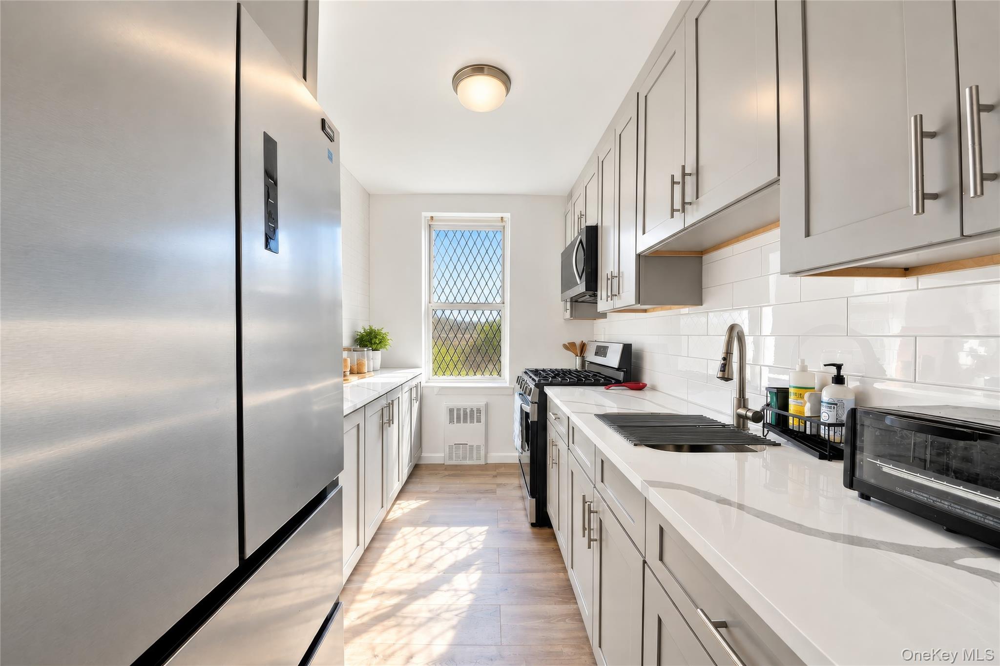 Beautifully renovated kitchen! Bright and thoughtfully updated, this s...