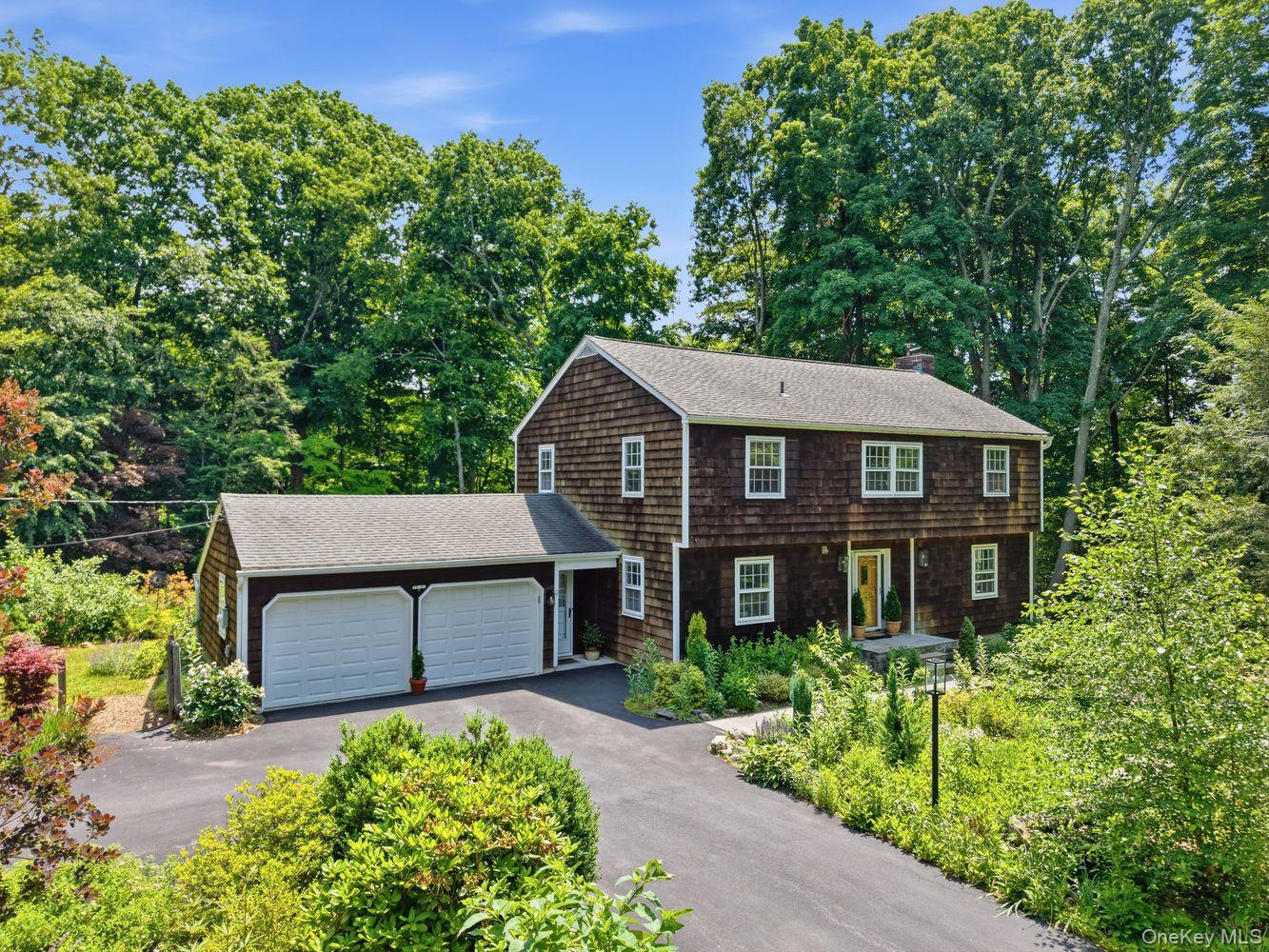 Move-in ready and beautifully maintained, 9 Cross Pond Road offers ref...
