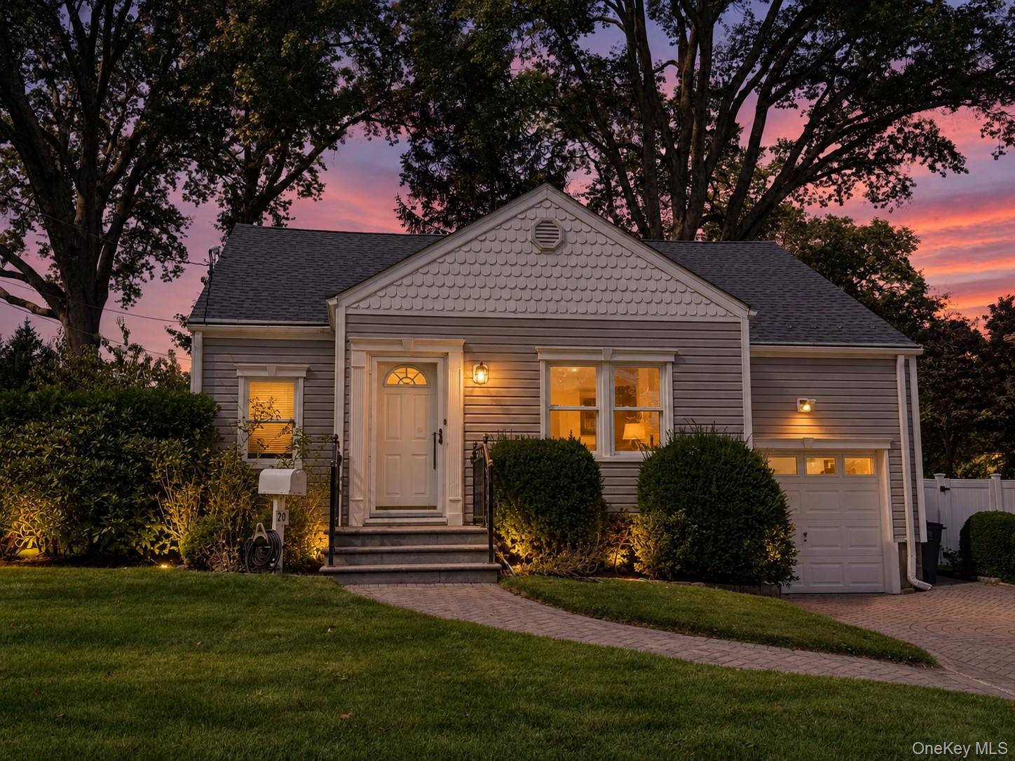 Beautiful Cape Cod home ideally situated on a quiet residential street...