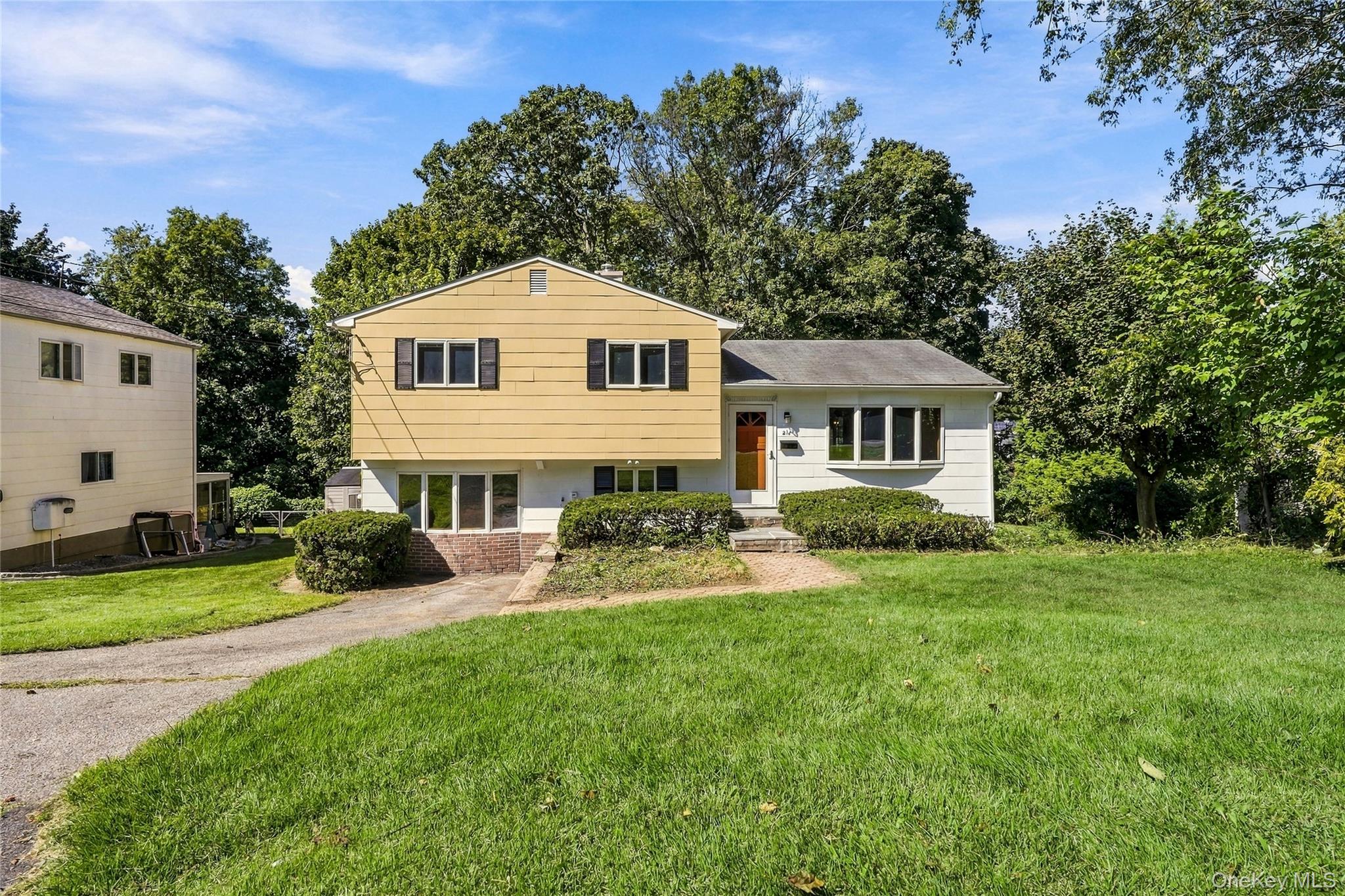 Charming 3-bedroom, 1-bath split-level ranch featuring original detail...
