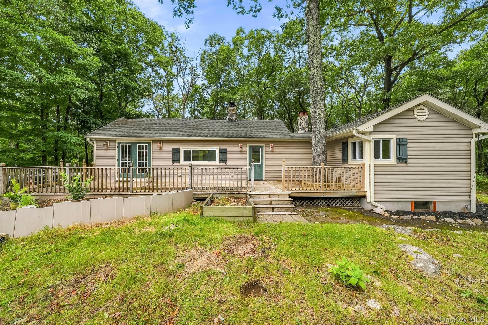 Welcome Home to Lake Peekskill! Charming, cozy, and full of possibilit...