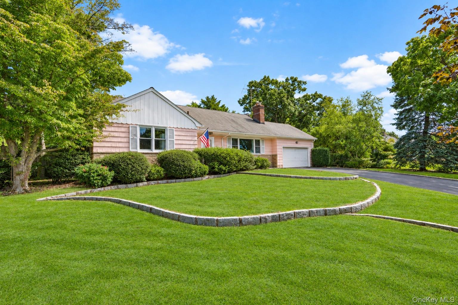 Welcome to 25 Manger Circle in Pelham Manor - a true ranch-style home...