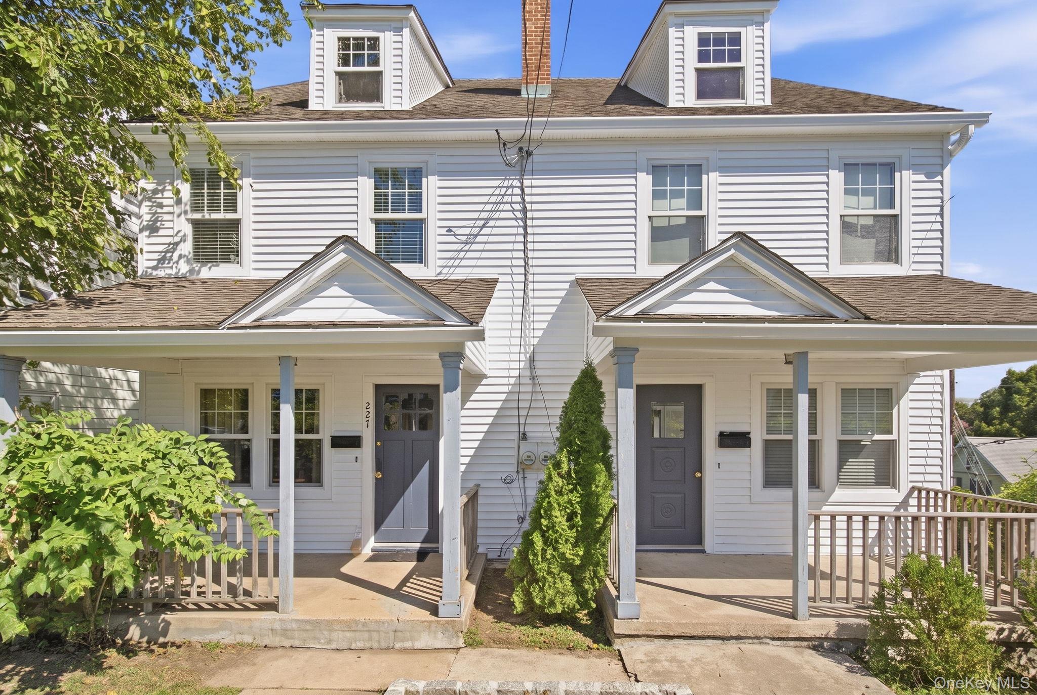 Welcome to this impeccably maintained, side-by-side Colonial duplex fe...