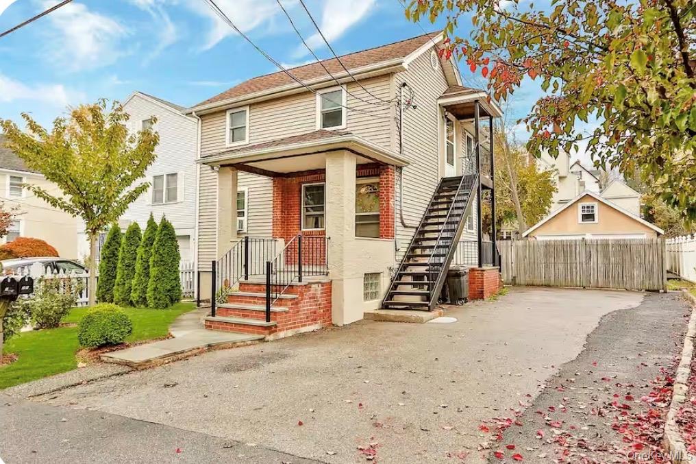 Well-maintained two-family home ideally located in the heart of Pleasa...