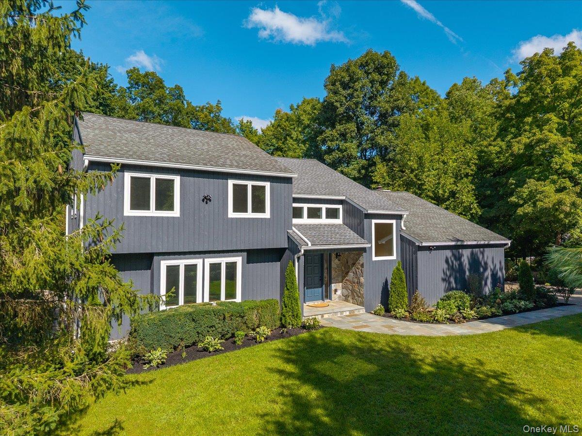 Privately set on 1.2 pristine acres in a desirable community, this bea...
