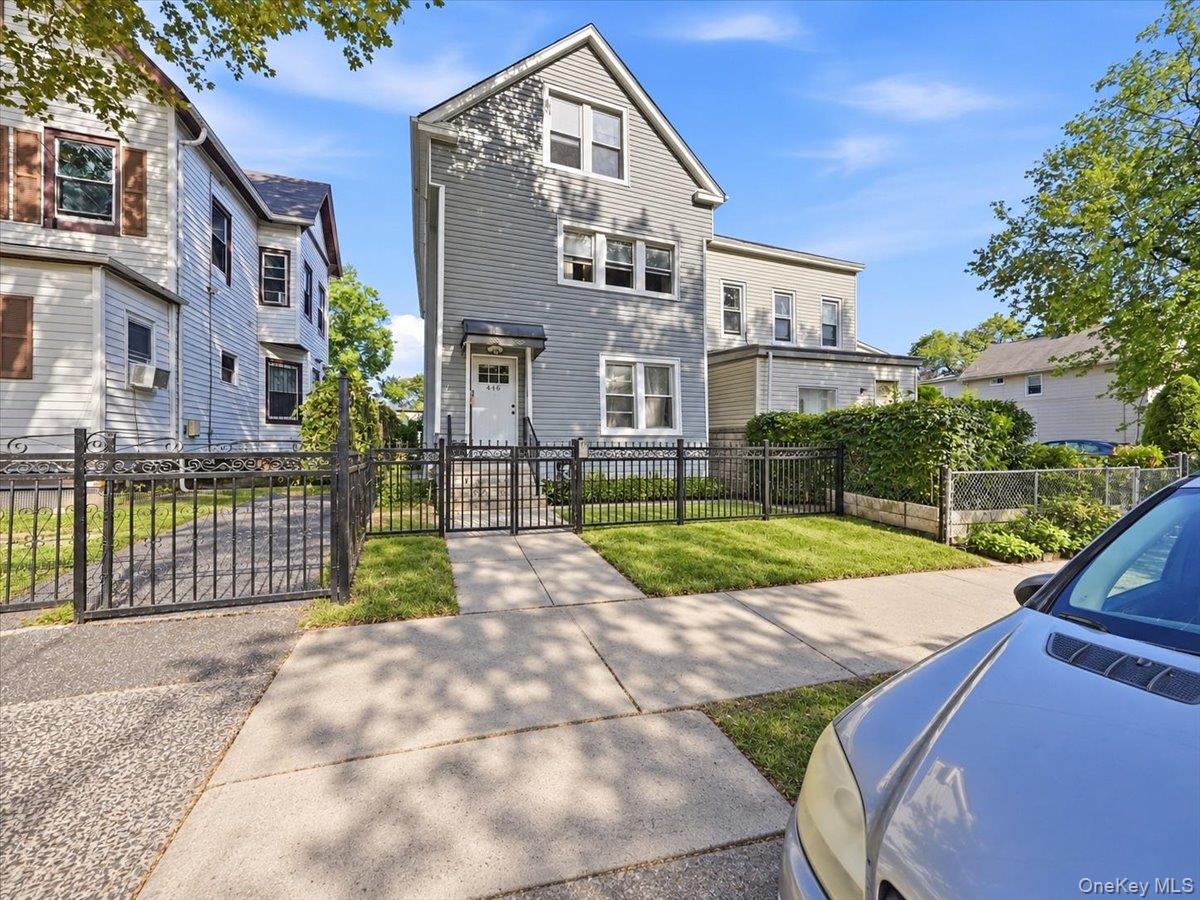 Welcome to 445 South 8th Avenue, this legal two-family home features a...